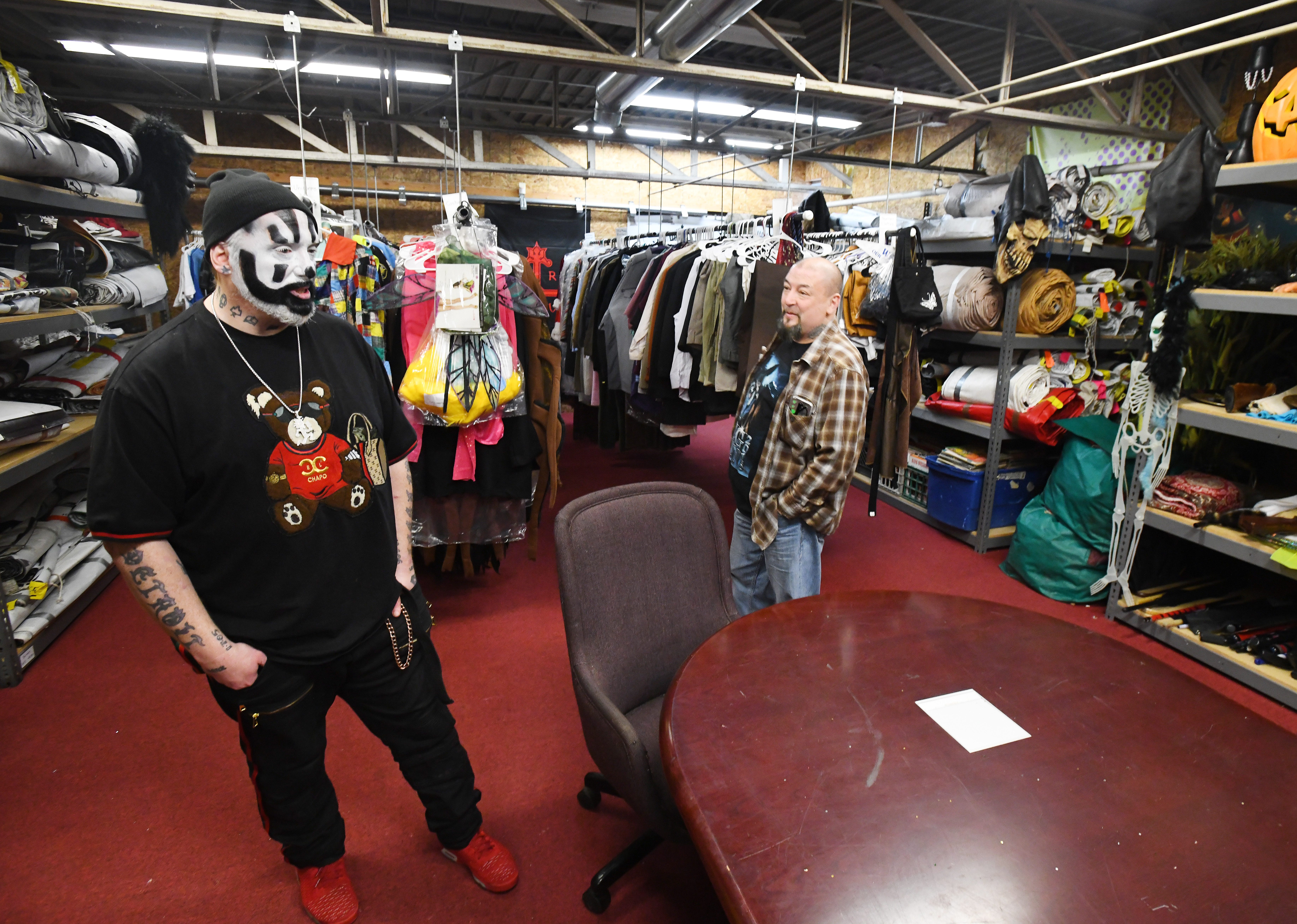 Violent J, aka Joseph Bruce of Insane Clown Posse, with Rudy "Rude Boy" Hill shows off costume storage where outfits and various paraphernalia are stored from their elaborate shows and tours.