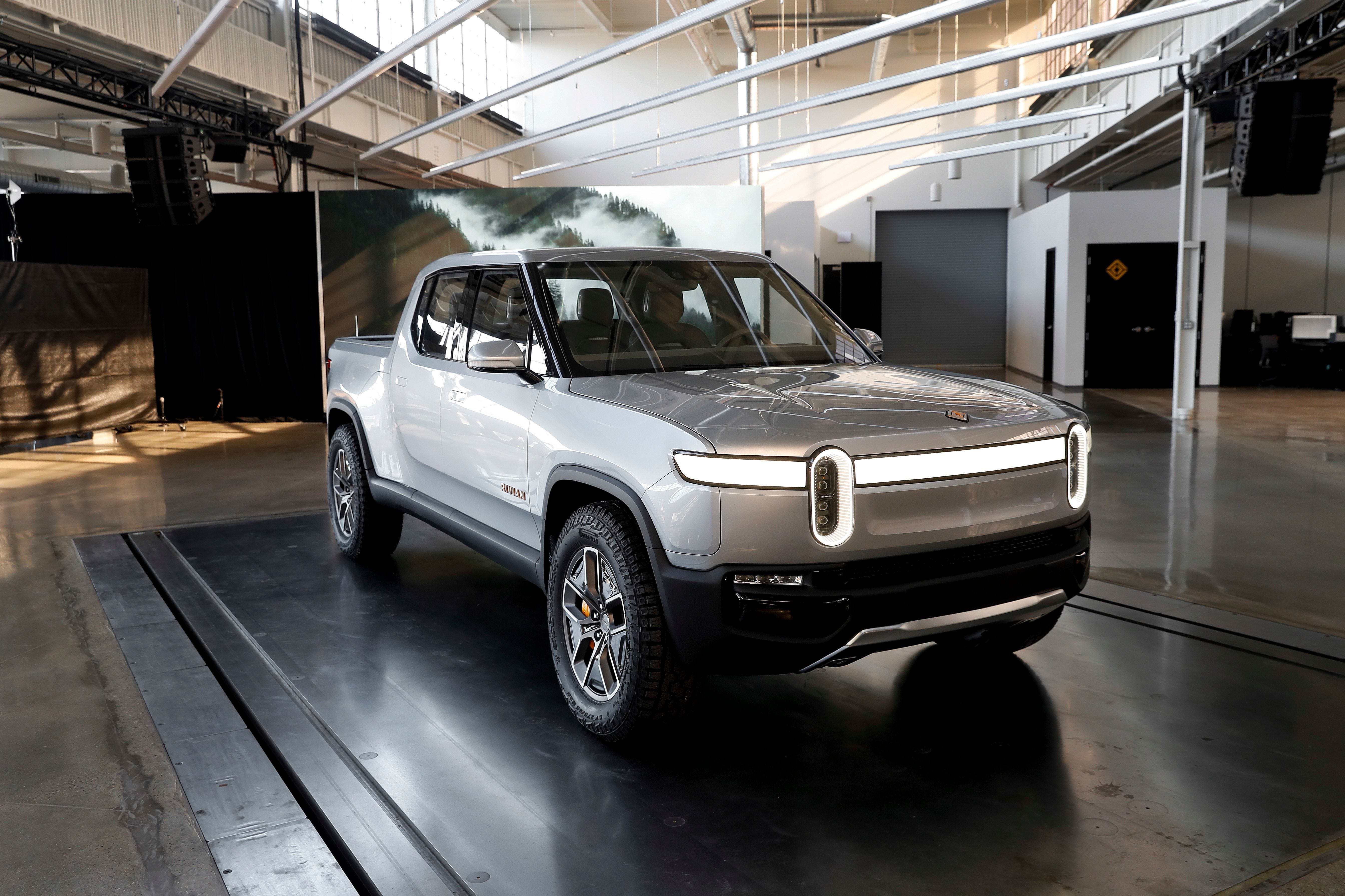 The fully electric Rivian R1T pickup. GM and Amazon are reportedly in talks to invest in the Plymouth-based company.
