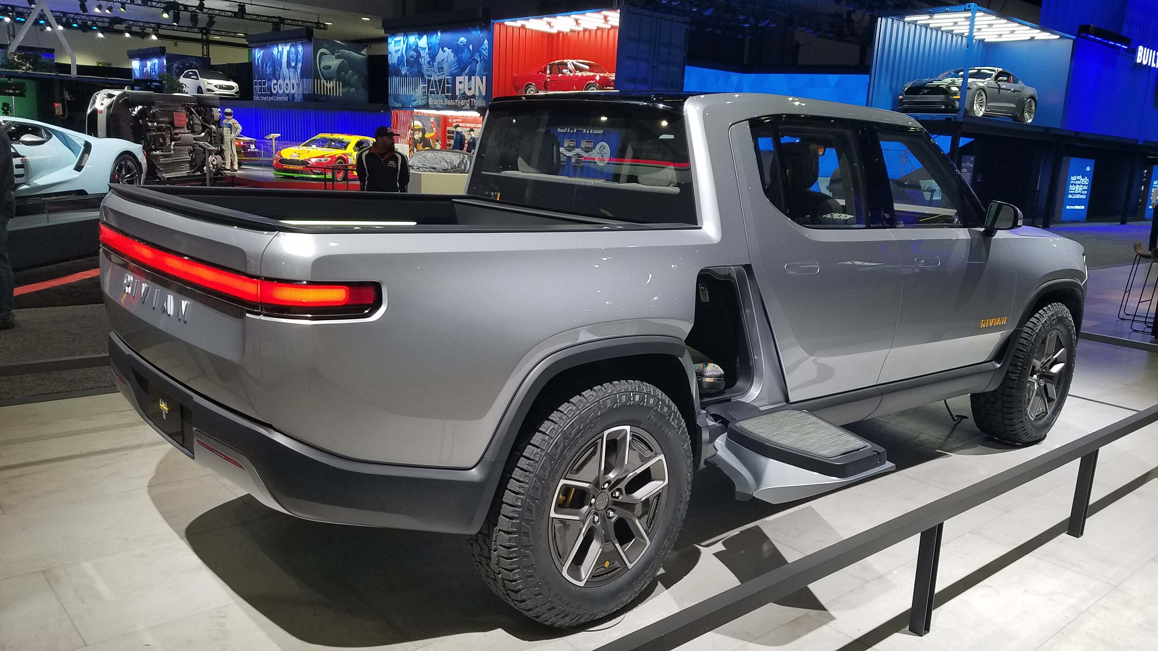 The Rivian R1T is about the same length as a Chevy Colorado mid-size pickup. With its batteries in the floor, however, it adds storage in the "frunk" as well as space behind the rear seats and under the bed.