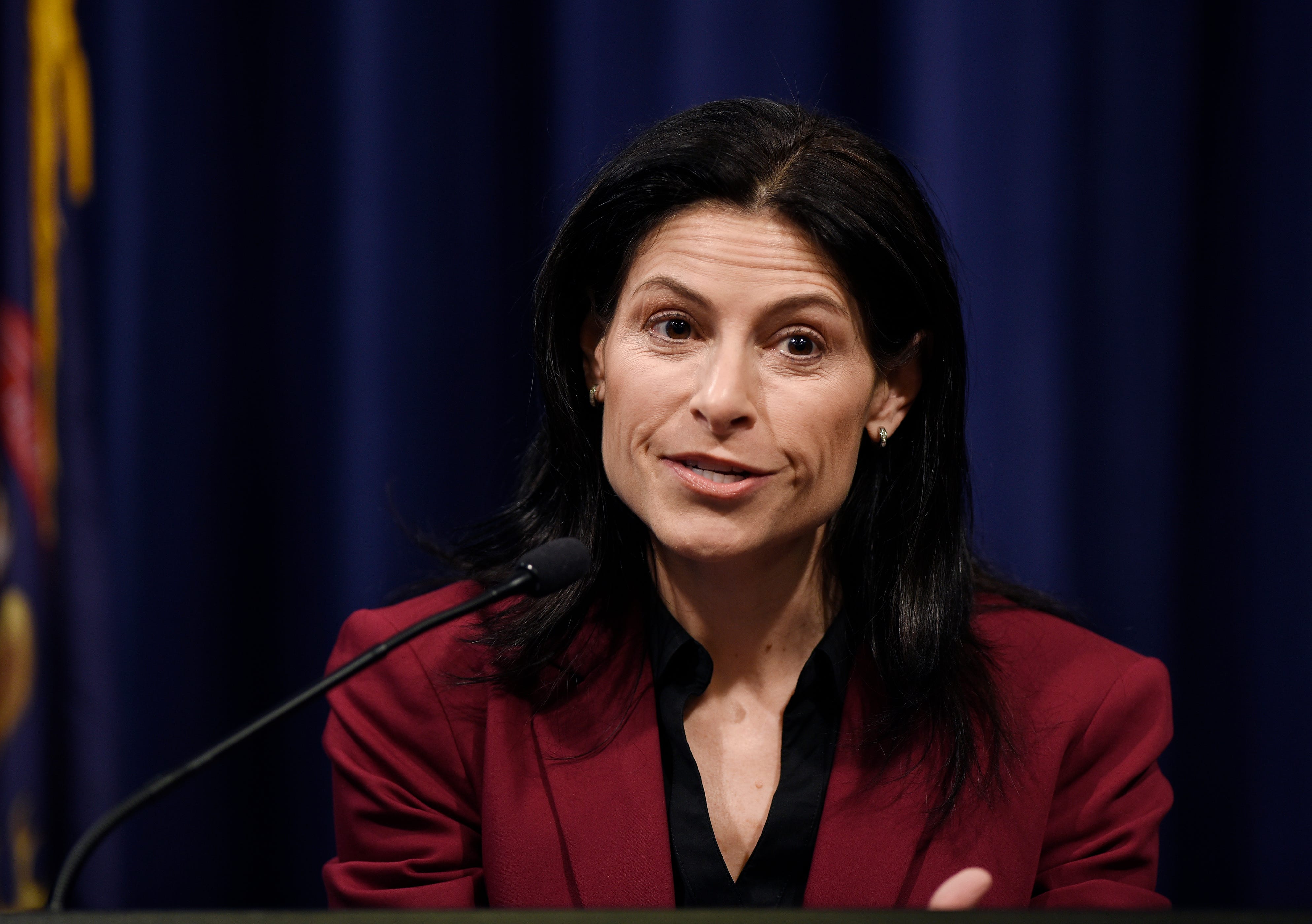 Attorney General Dana Nessel answers questions from reporters during a press conference Thursday morning in Lansing.