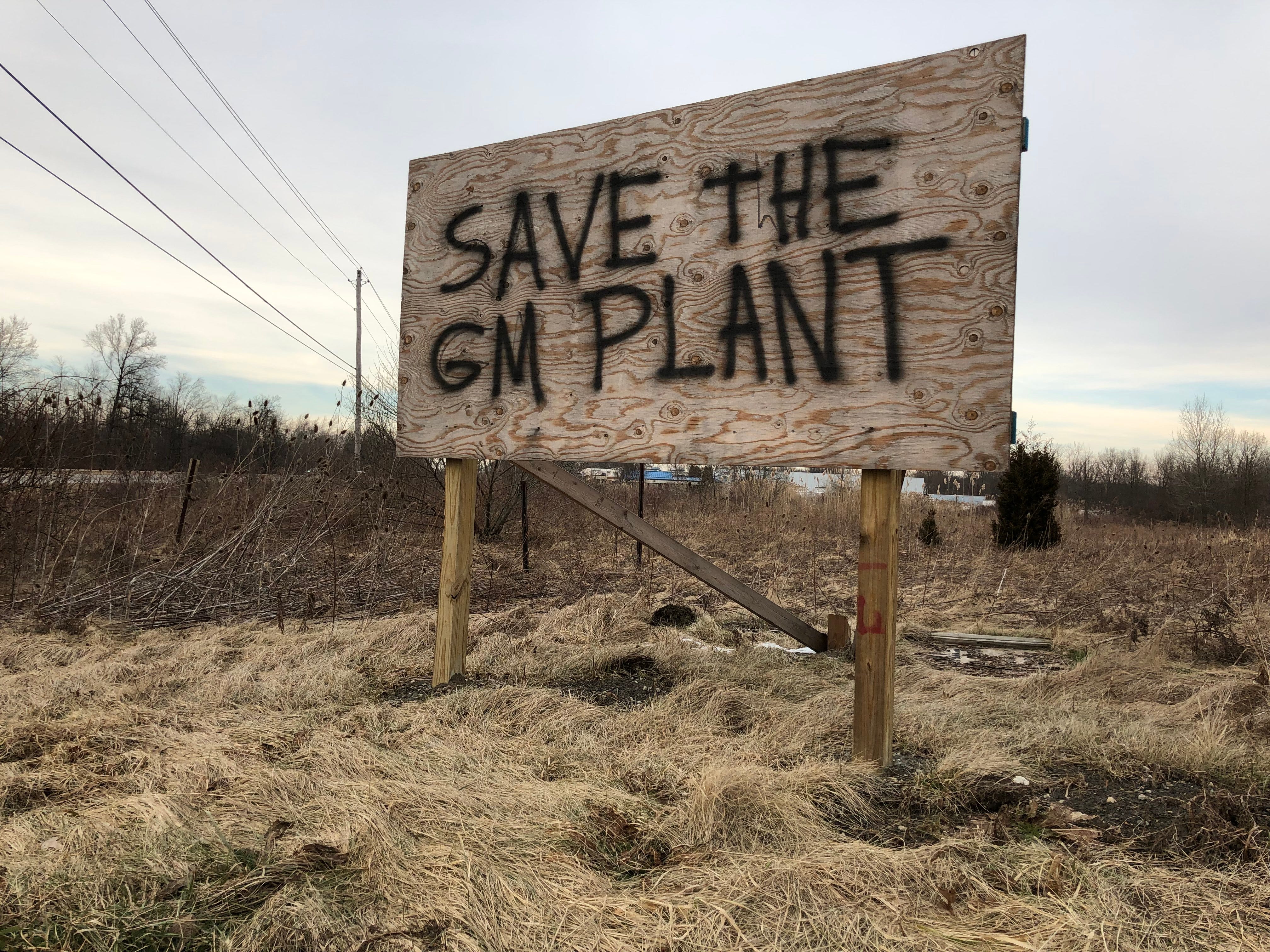A spray-painted sign on Ellsworth Bailey Road in Lordstown, Ohio pleads to save General Motors Co.’s Lordstown Assembly Plant.