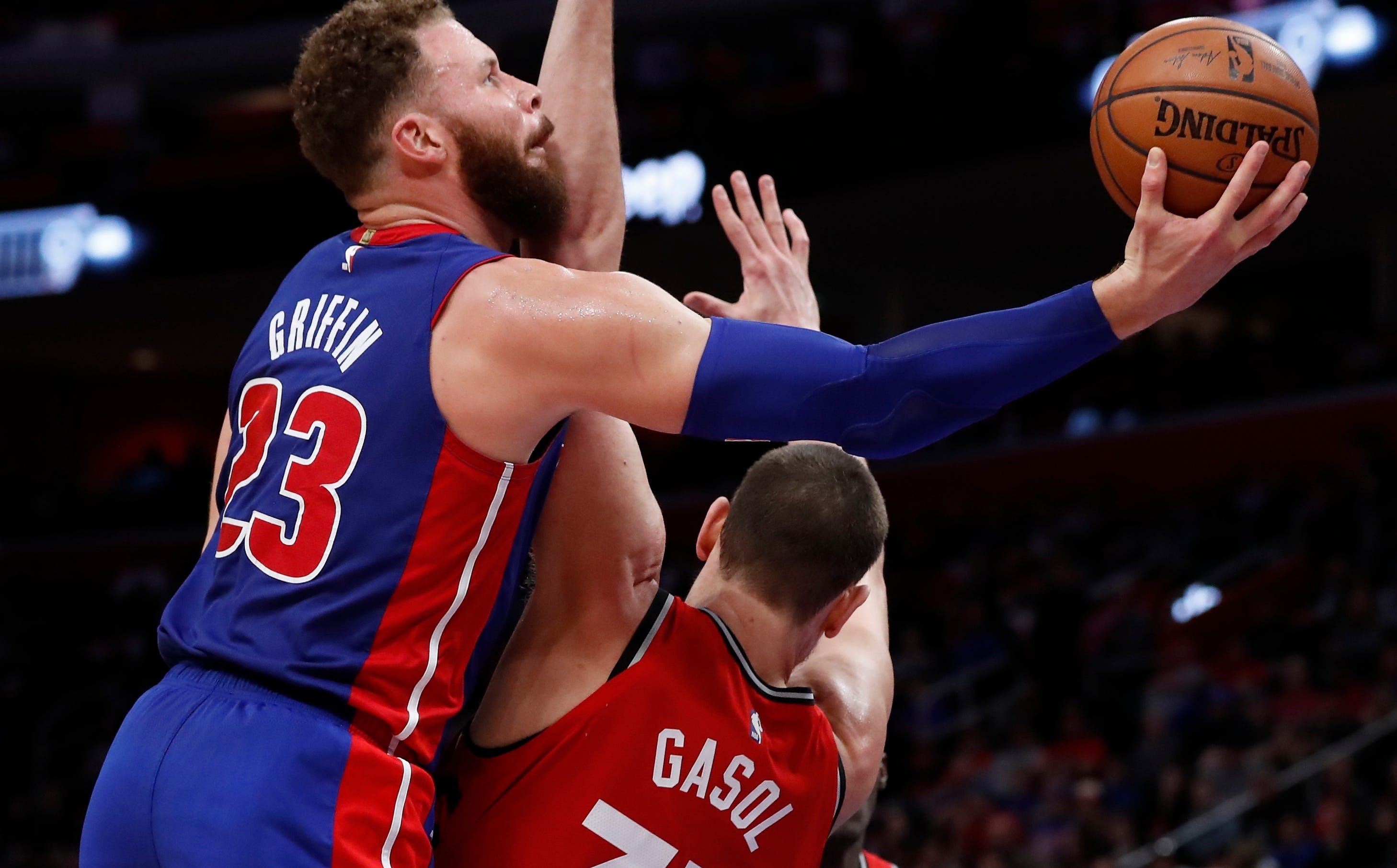 Detroit Pistons forward Blake Griffin (23) attempts a layup as Toronto Raptors center Marc Gasol (33) defends during the first half.