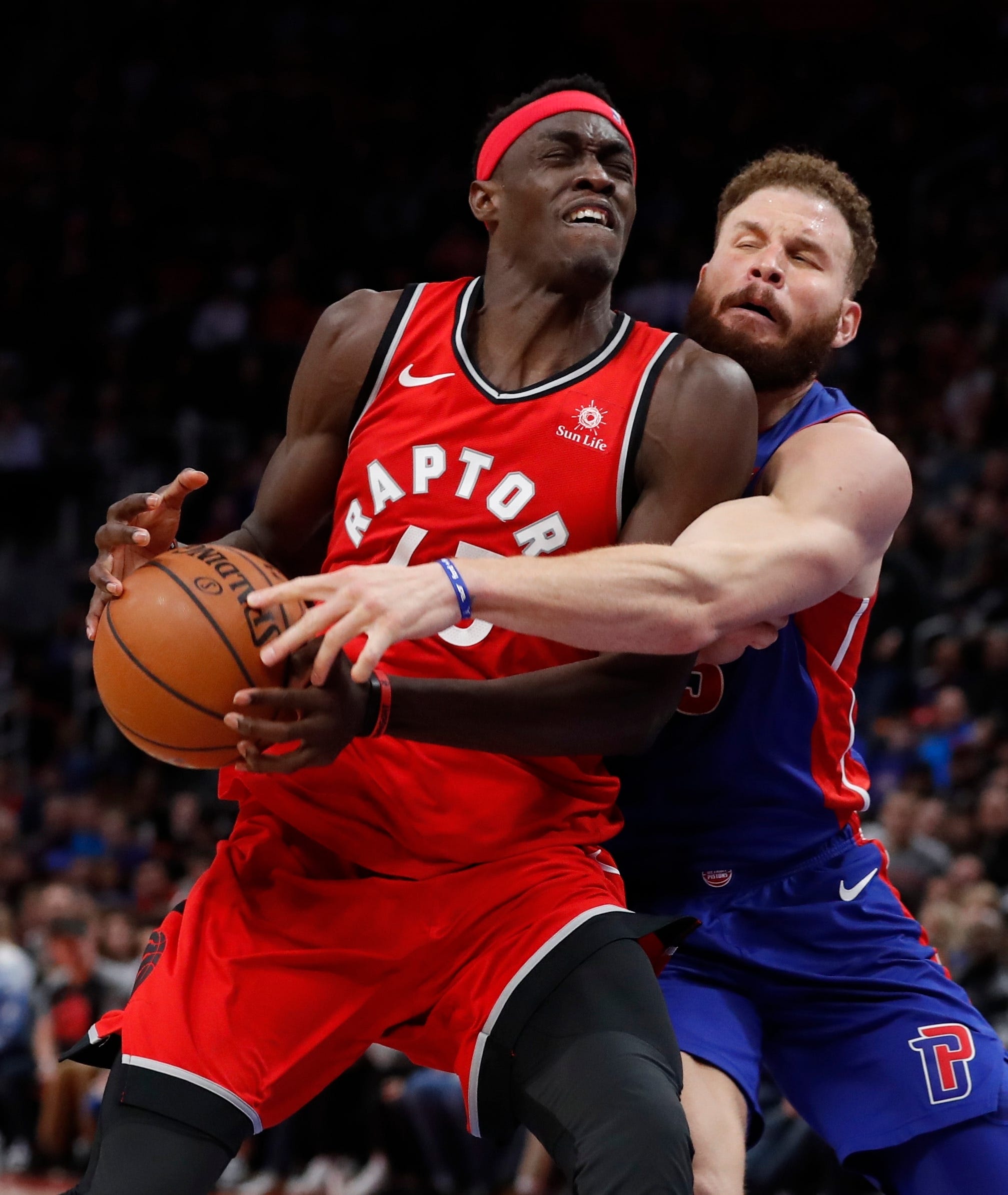 Detroit Pistons forward Blake Griffin knocks the ball away from Toronto Raptors forward Pascal Siakam during the second half.