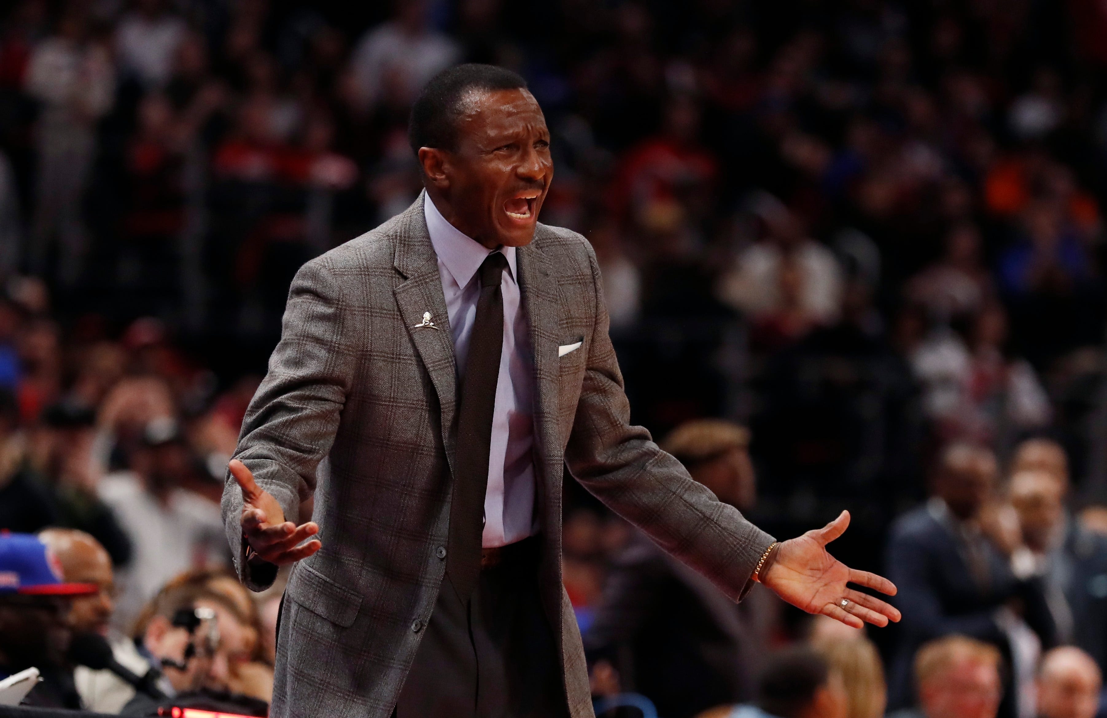 Detroit Pistons head coach Dwane Casey reacts after a call during the second half.