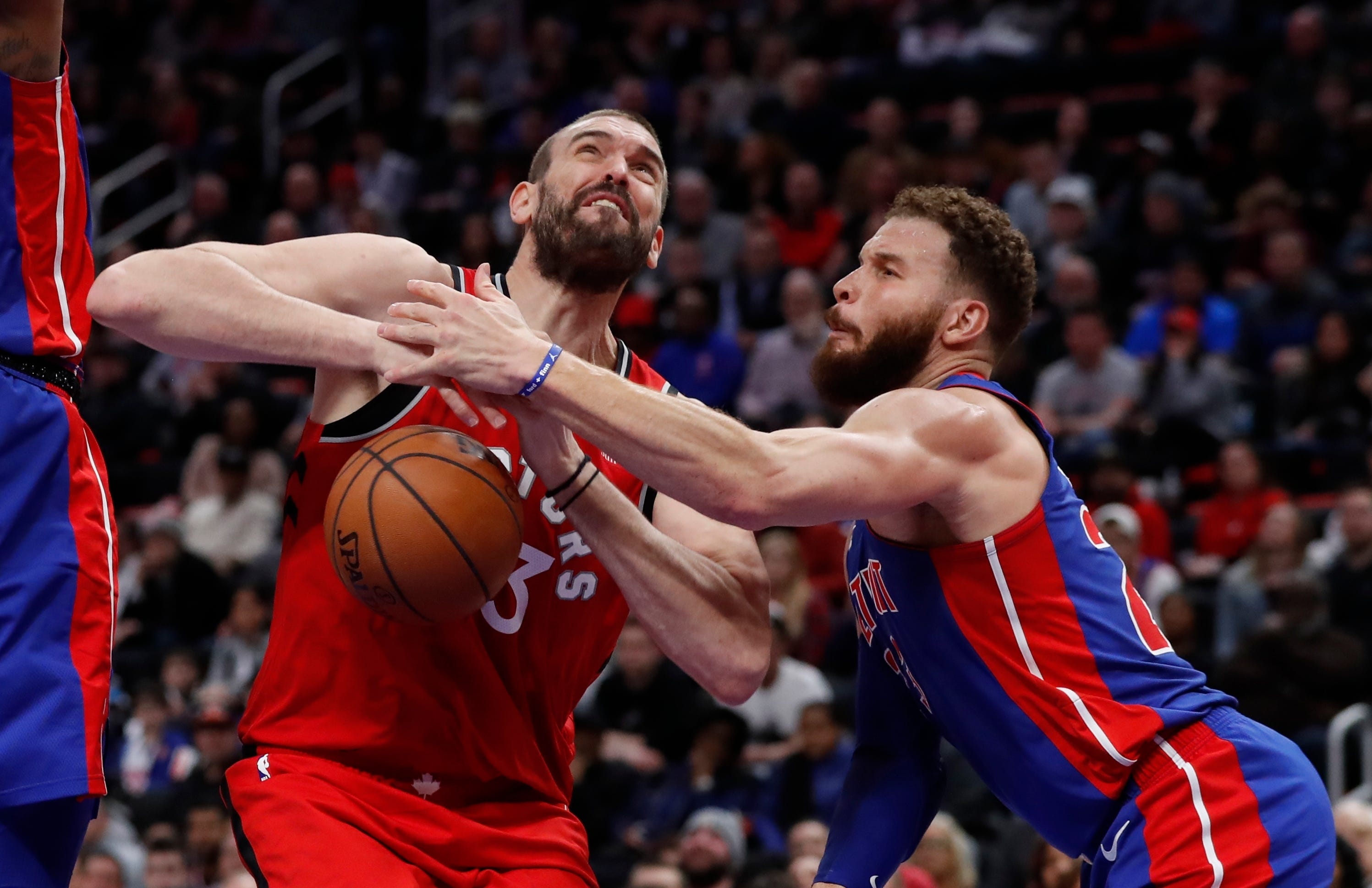 Detroit Pistons forward Blake Griffin knocks the ball away from Toronto Raptors center Marc Gasol (33) during the second half.