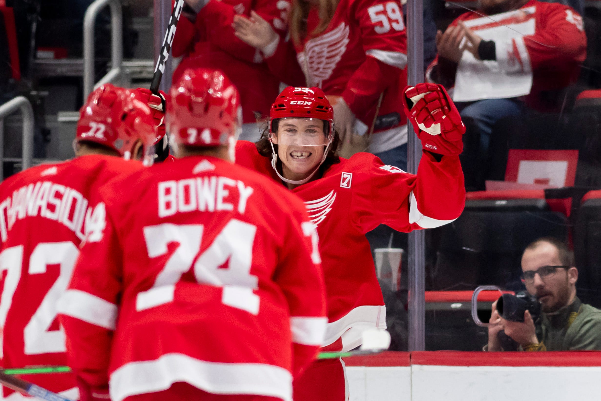 Detroit left wing Tyler Bertuzzi celebrates with his teammates after scoring in the second period.