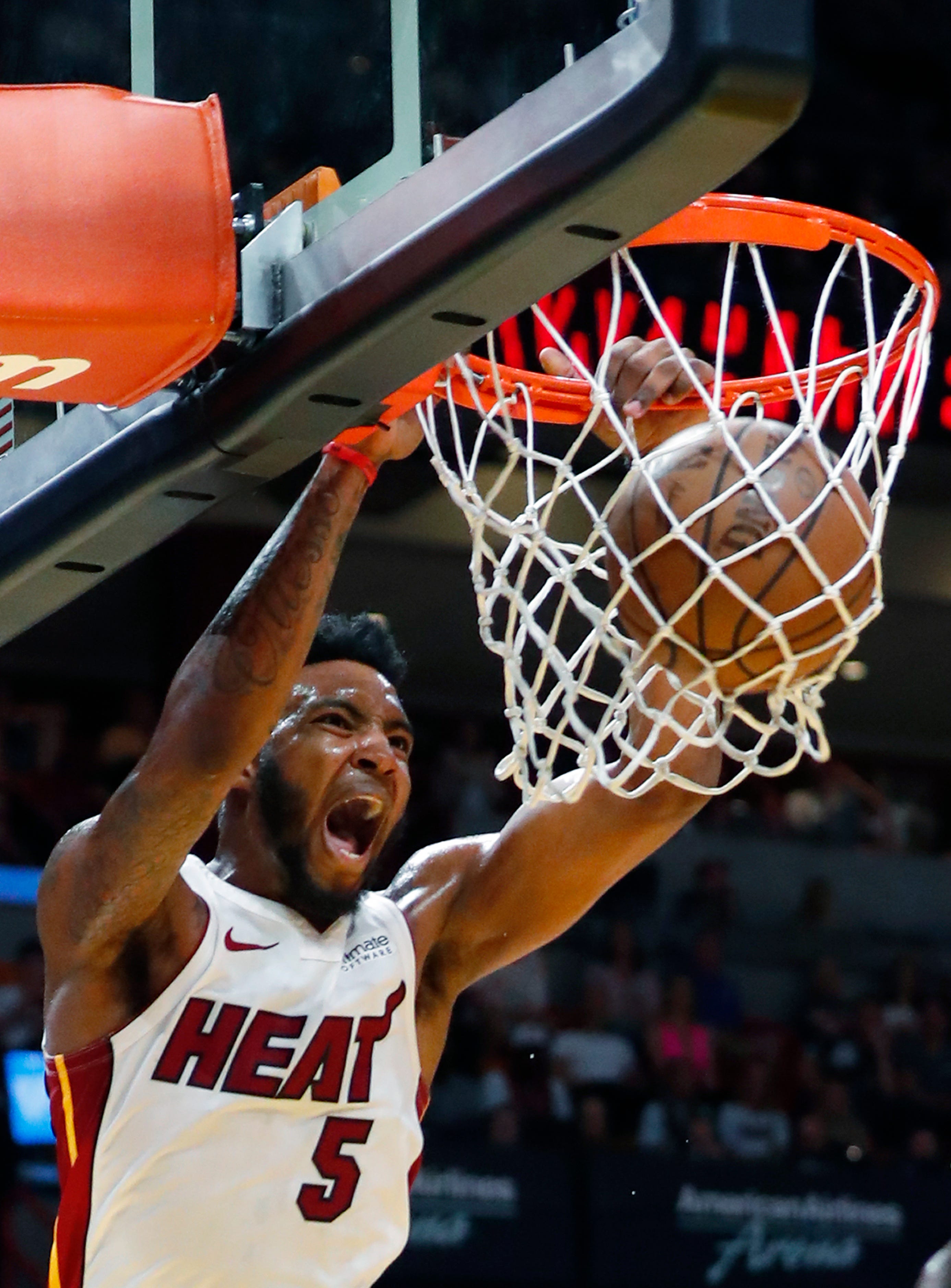 Miami Heat forward Derrick Jones Jr. dunks the ball during the second half.