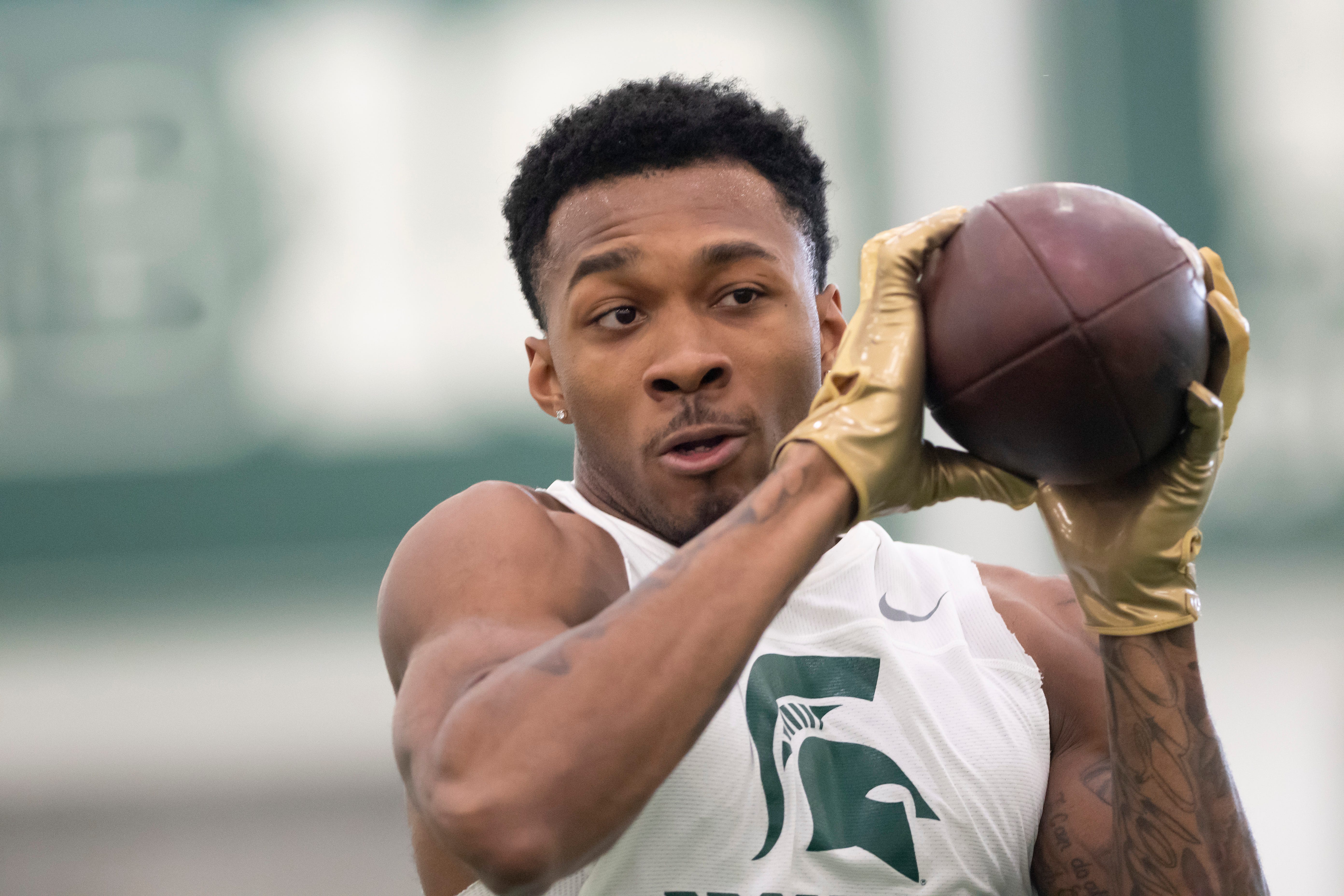 Michigan State cornerback Justin Layne catches a pass during an NFL pro day.