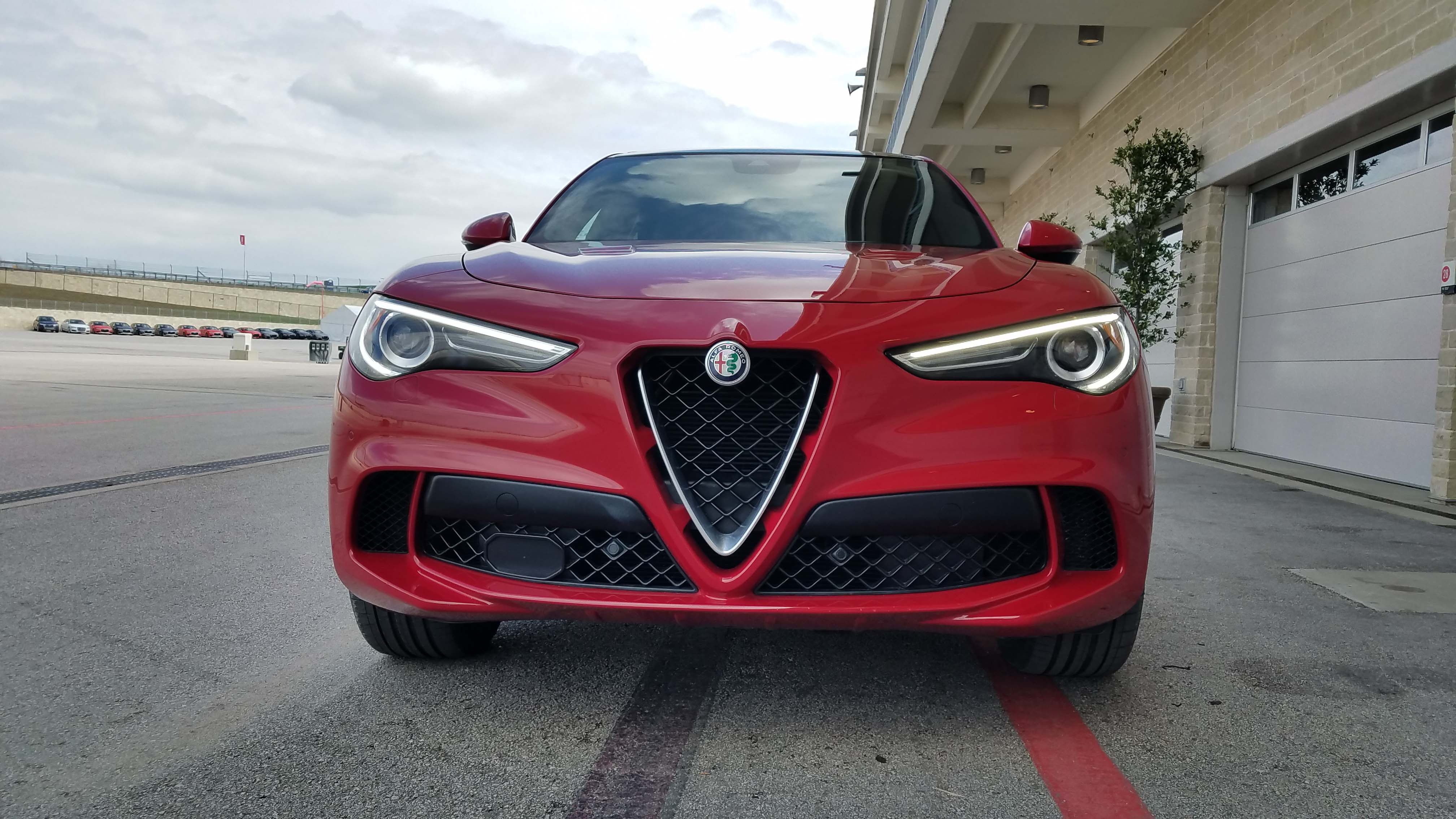 The Stelvio Quadrifoglio features Alfa's signature Trilobo grille, with larger lower air scoops than the standard Stelvio to feed its big engine.