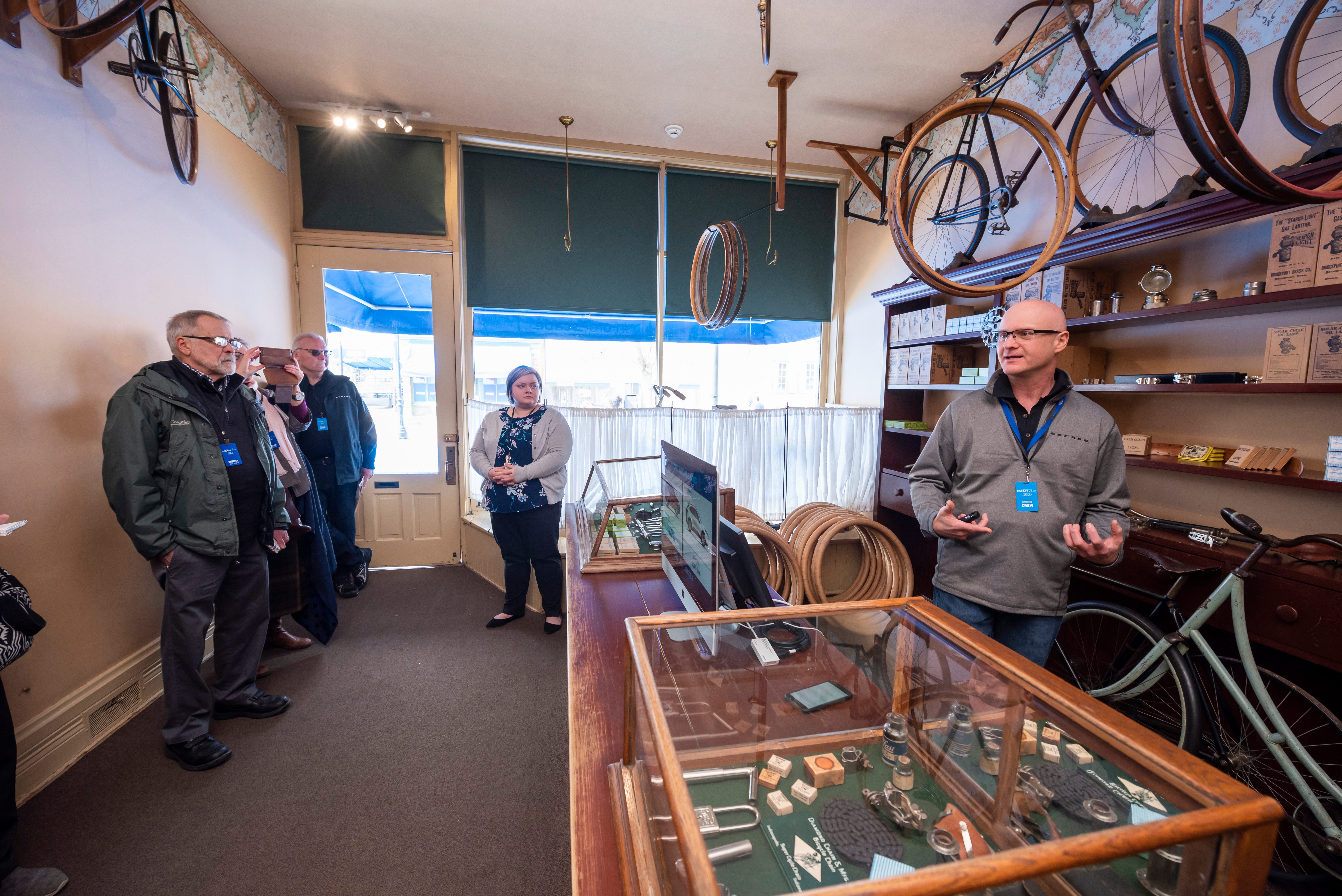 Dean Nowicki, the program manager for the Ford Escape, talks about the vehicle from inside the Wright brother's bicycle shop inside Greenfield Village.