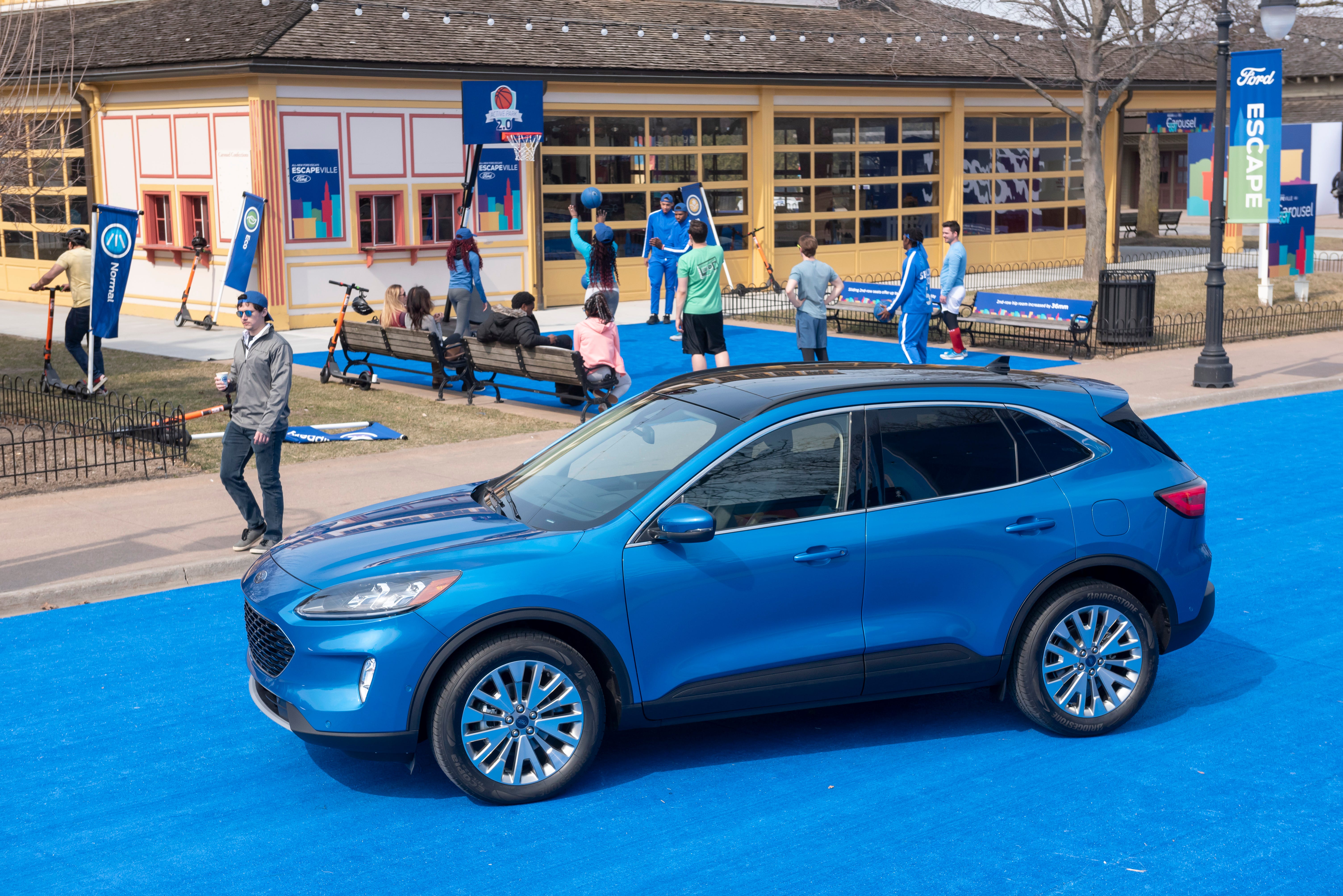 Performers, artists and actors spend time with the 2020 Ford Escape during a reveal of the vehicle at Greenfield Village.