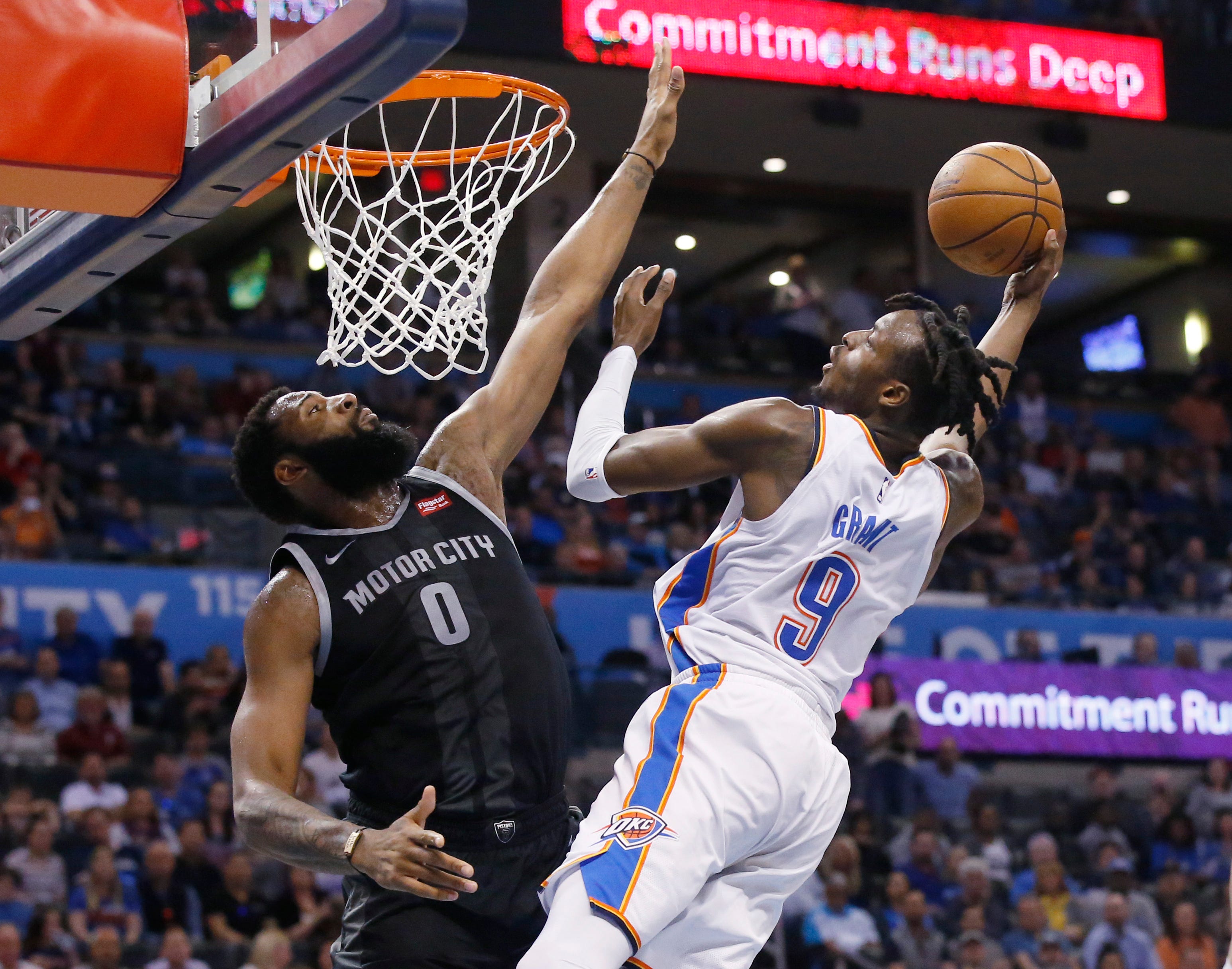 Oklahoma City Thunder forward Jerami Grant (9) shoots as Detroit Pistons center Andre Drummond (0) defends during the second half.