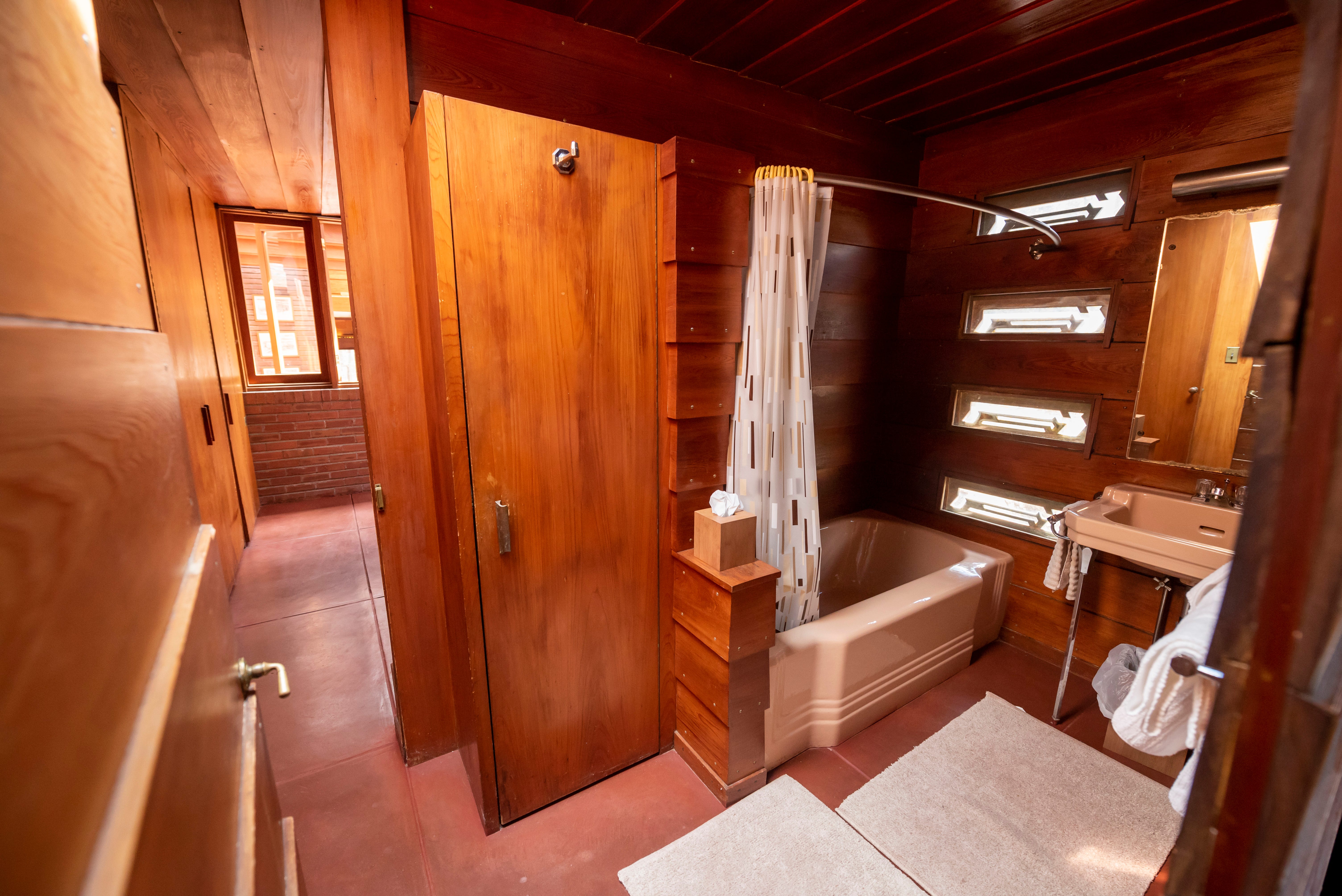 A Jack-and-Jill bathroom between two of the bedrooms. The house has three and a half baths.