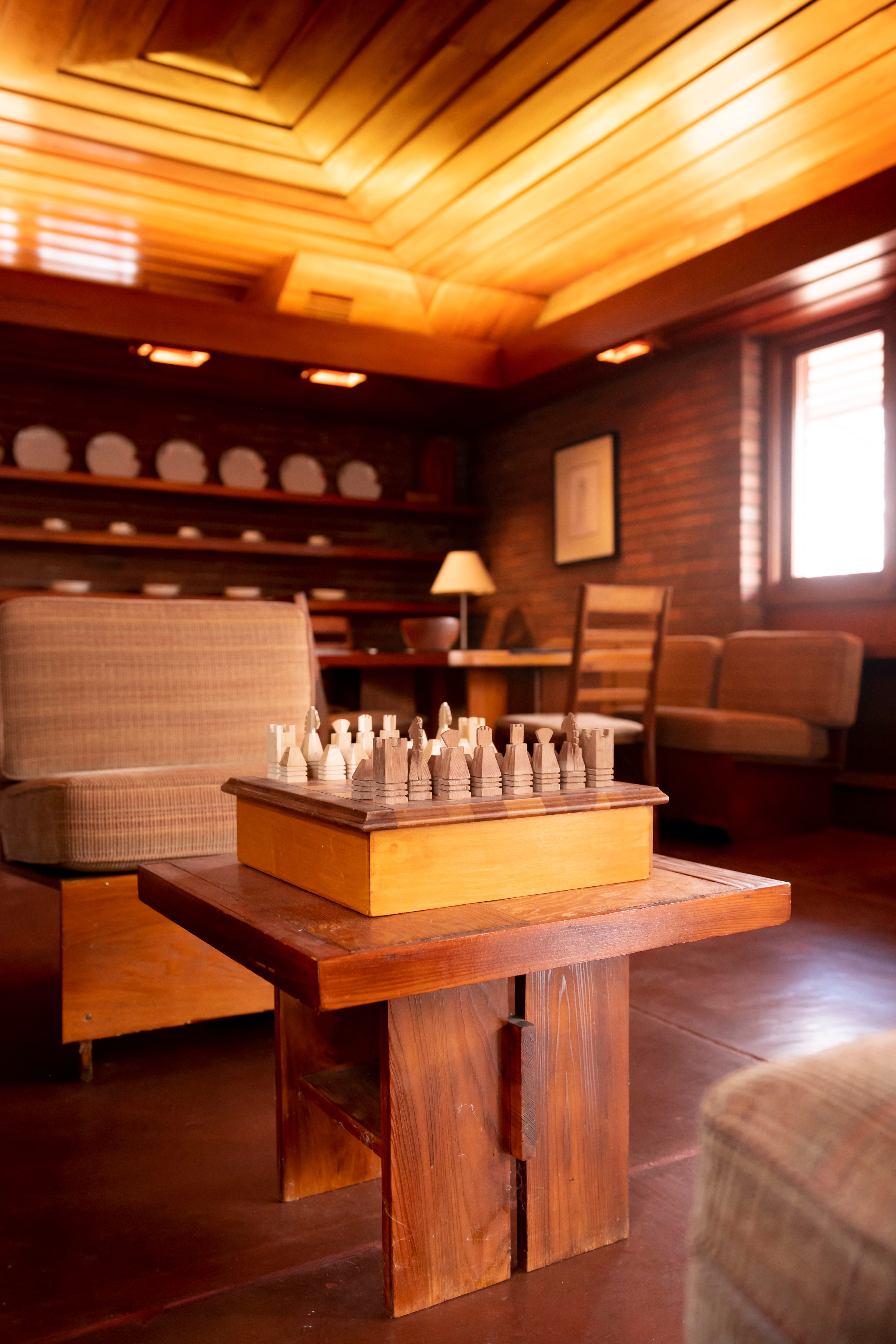 A chess set sits in the main living area.