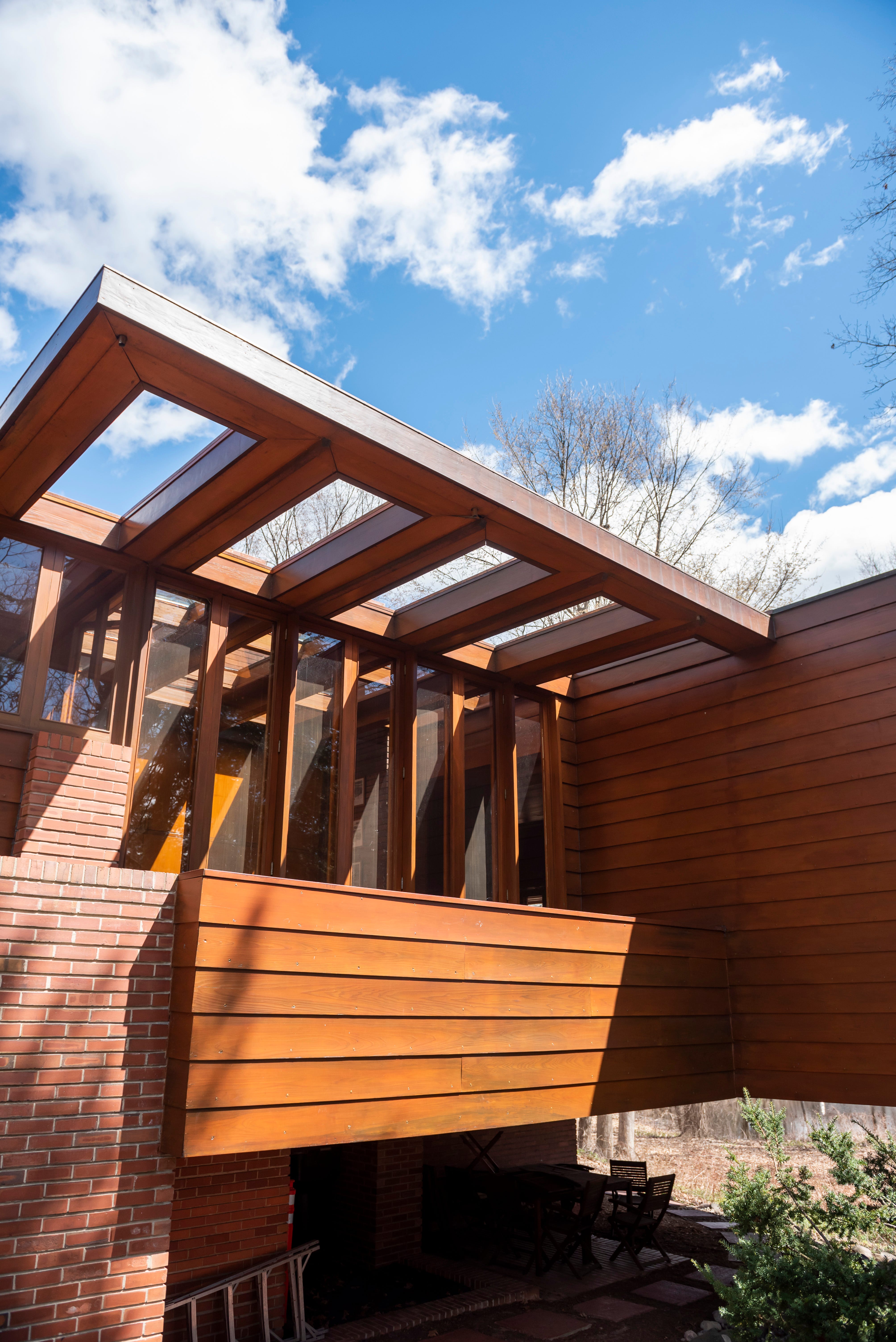 Constructed of brick and cypress, with no garage, the Affleck house is an example of what Frank Lloyd Wright called a Usonian home.