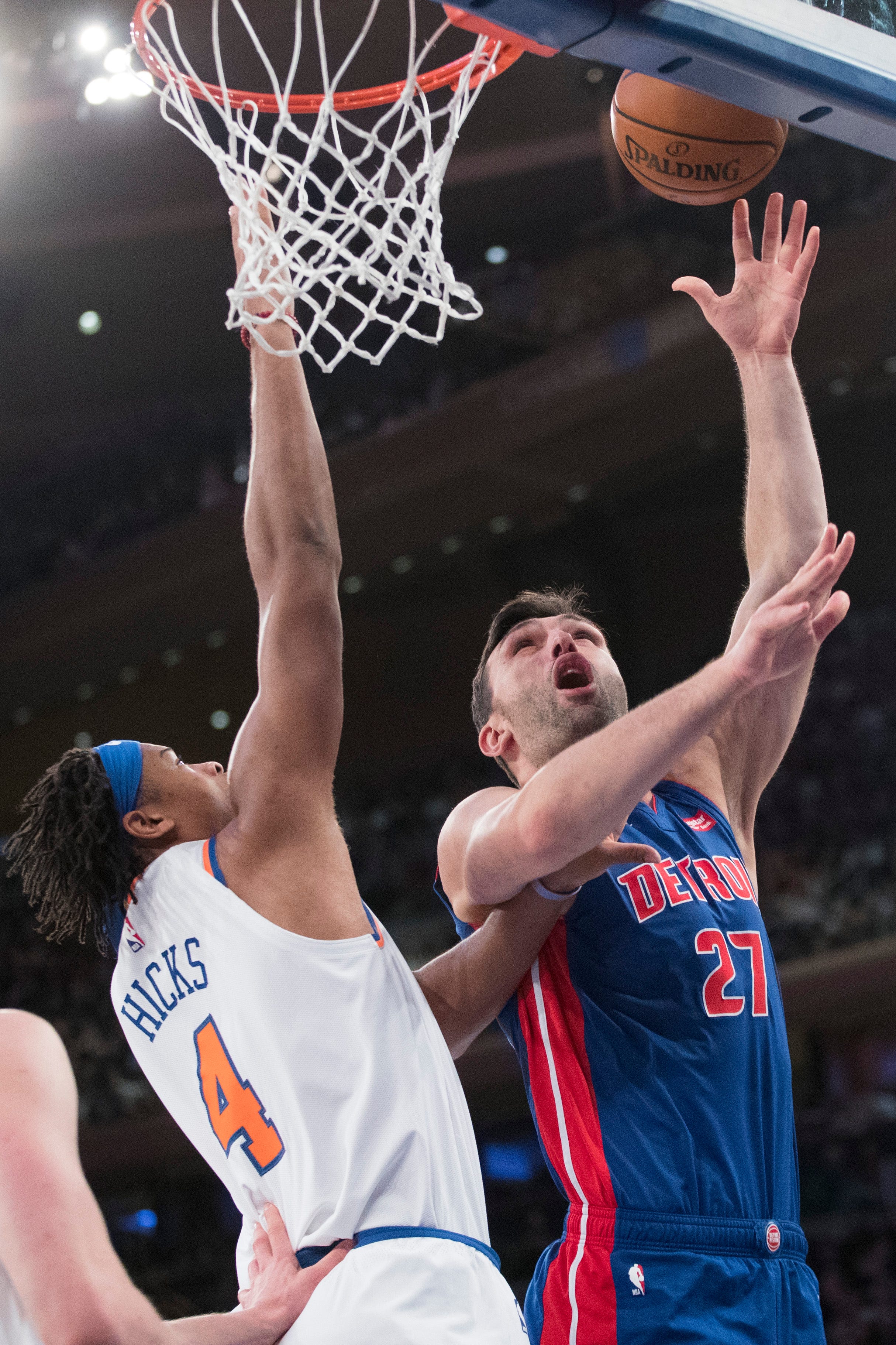 Detroit Pistons center Zaza Pachulia (27) goes to the basket against New York Knicks forward Isaiah Hicks (4) during the first half.
