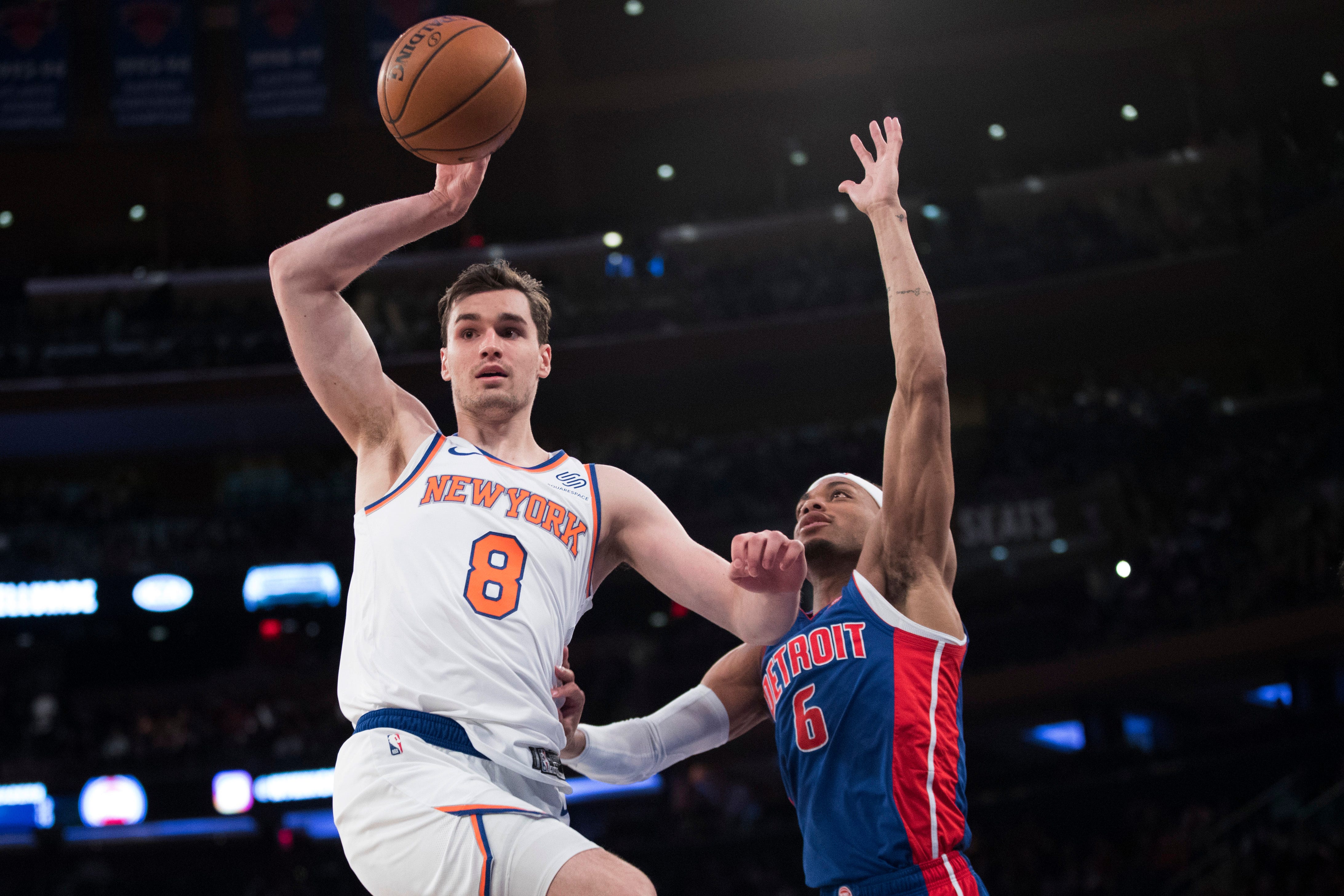 New York Knicks forward Mario Hezonja (8) goes to the basket against Detroit Pistons guard Bruce Brown (6) during the second half.