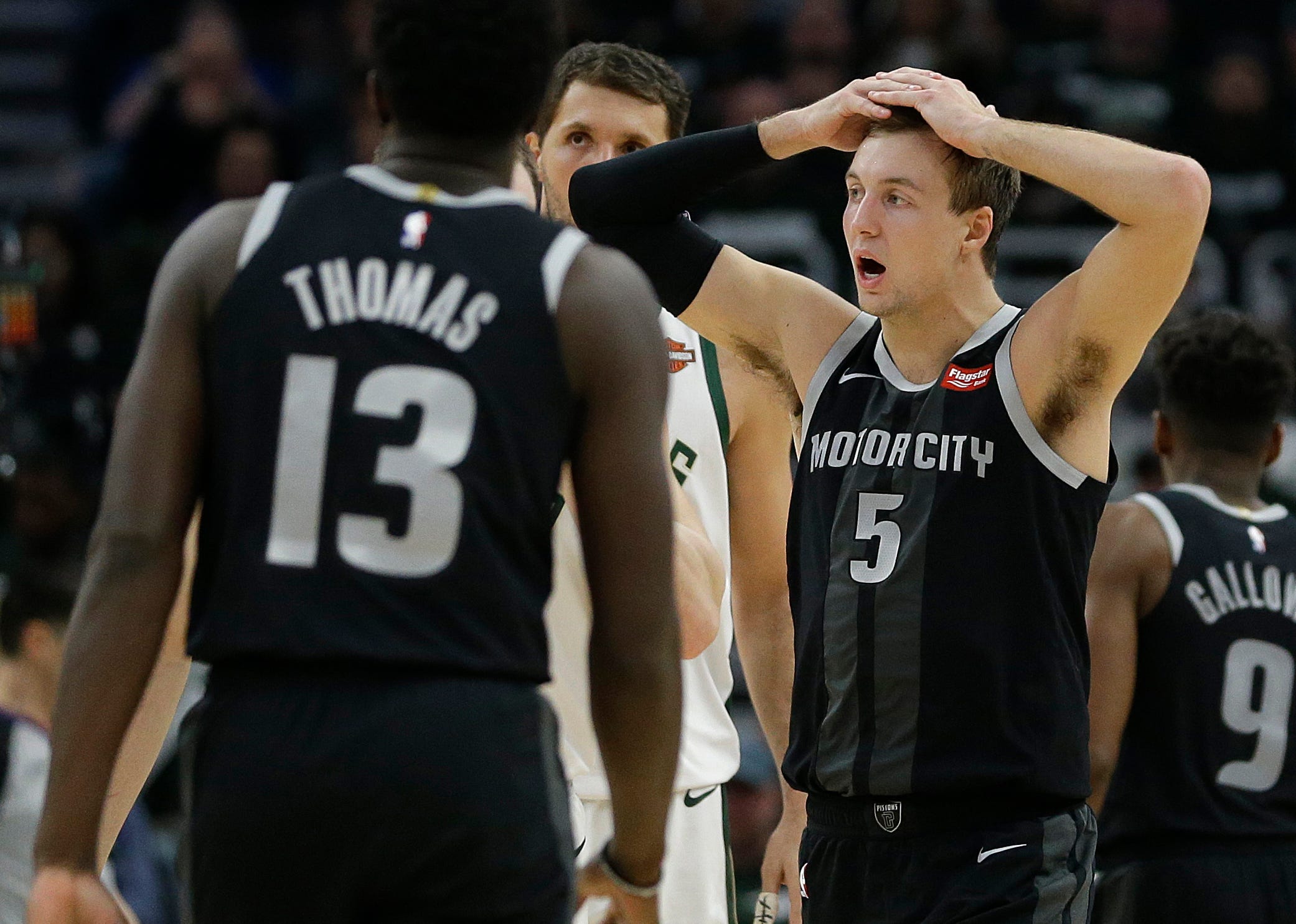 Detroit Pistons ' Luke Kennard (5) reacts during the second half of Game 1 of the first-round playoff series against the Milwaukee Bucks on Sunday in Milwaukee. The Bucks won, 121-86.