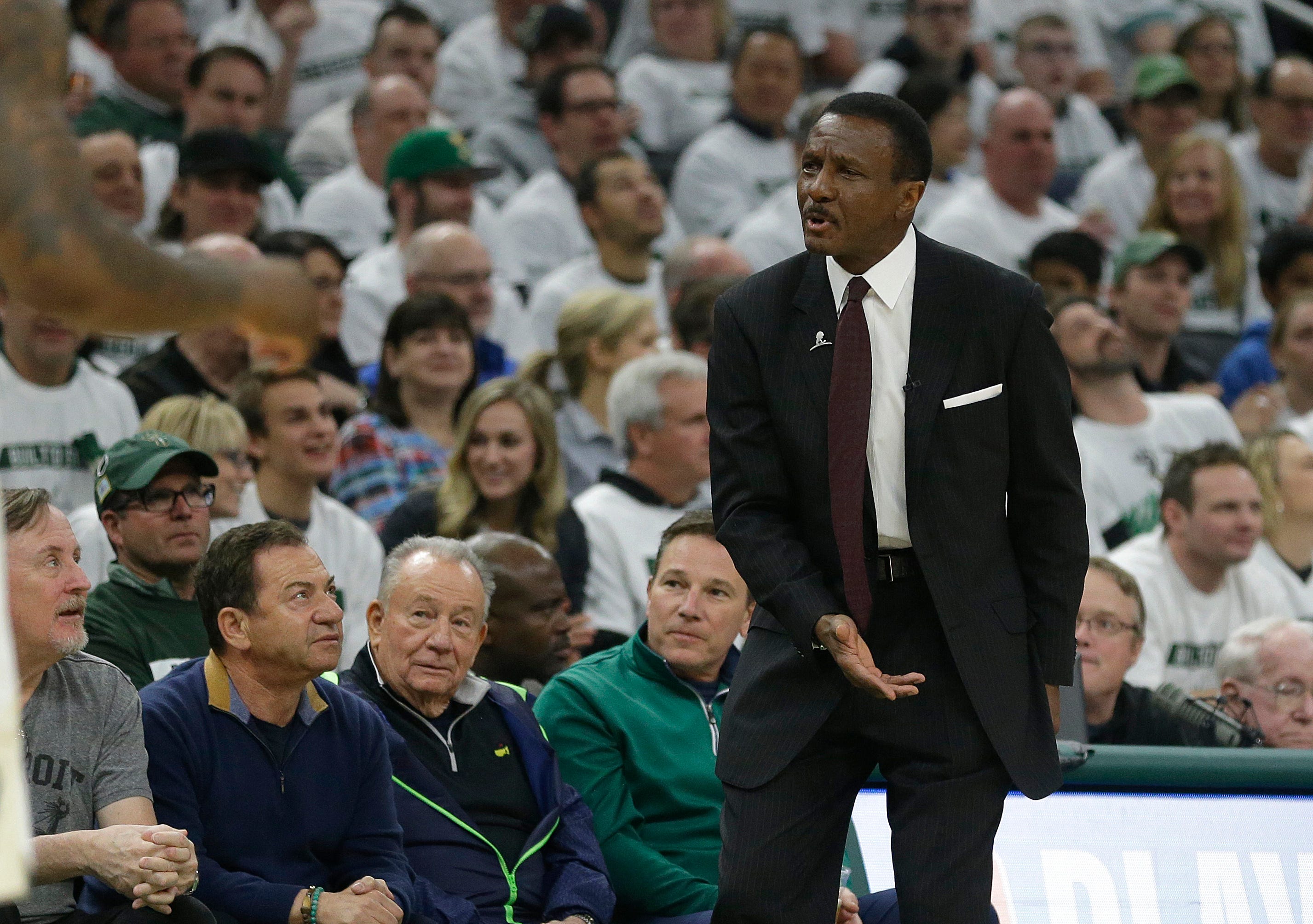Pistons coach Dwane Casey reacts to a call during the first half.