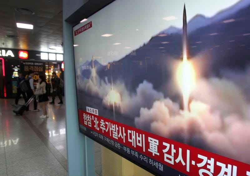 A TV shows file footage of North Korea's missile launch during a news program at the Seoul Railway Station in Seoul, South Korea, Saturday, May 4, 2019.