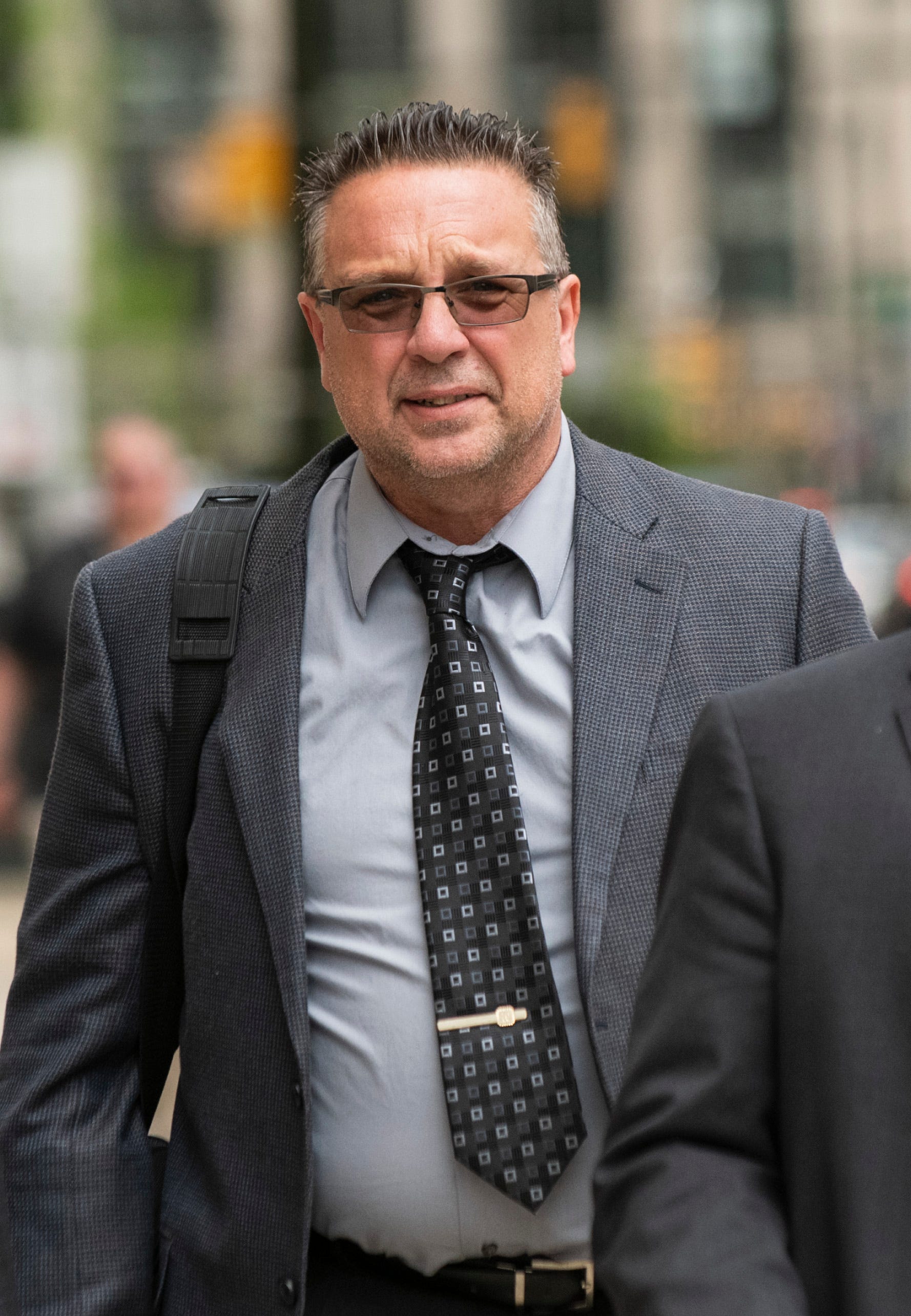 Defendant James Warner, a former field inspector at Detroit Metro Airport who is charged with taking bribes, leaves the Theodore Levin Federal Courthouse in downtown Detroit on May 21, 2019.