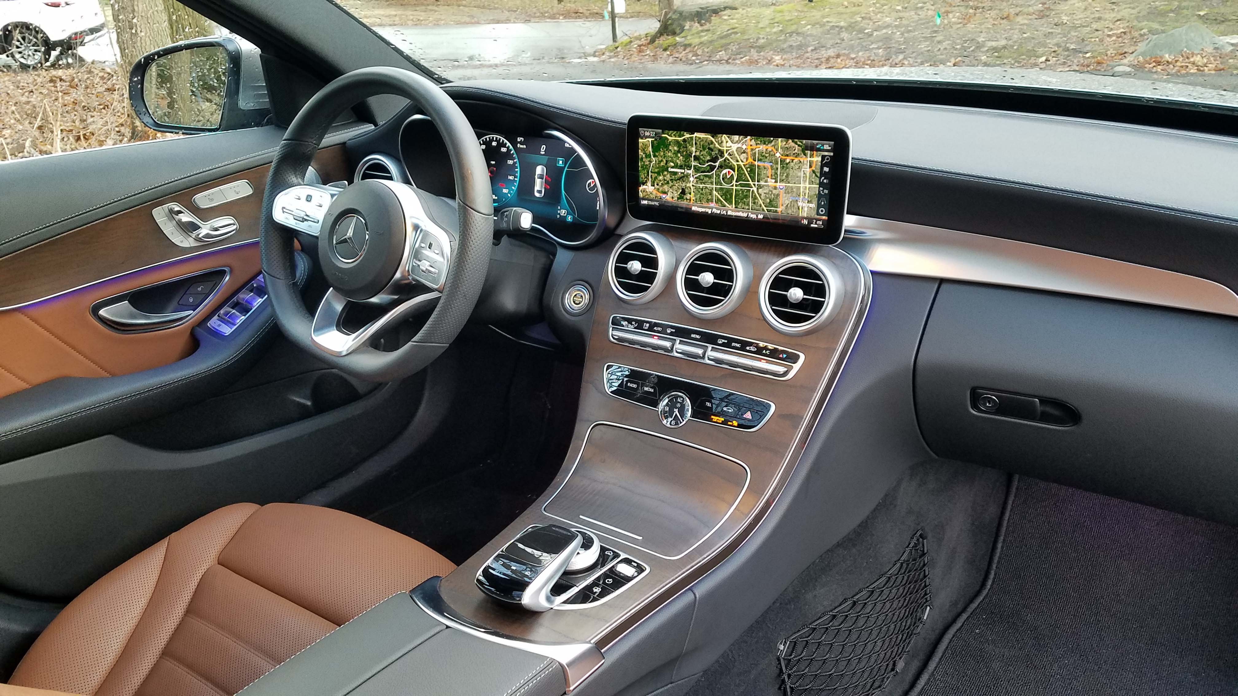 The interior of the 2019 Mercedes C300 is the best in luxury with ornate decoration and controls — and premium materials.
