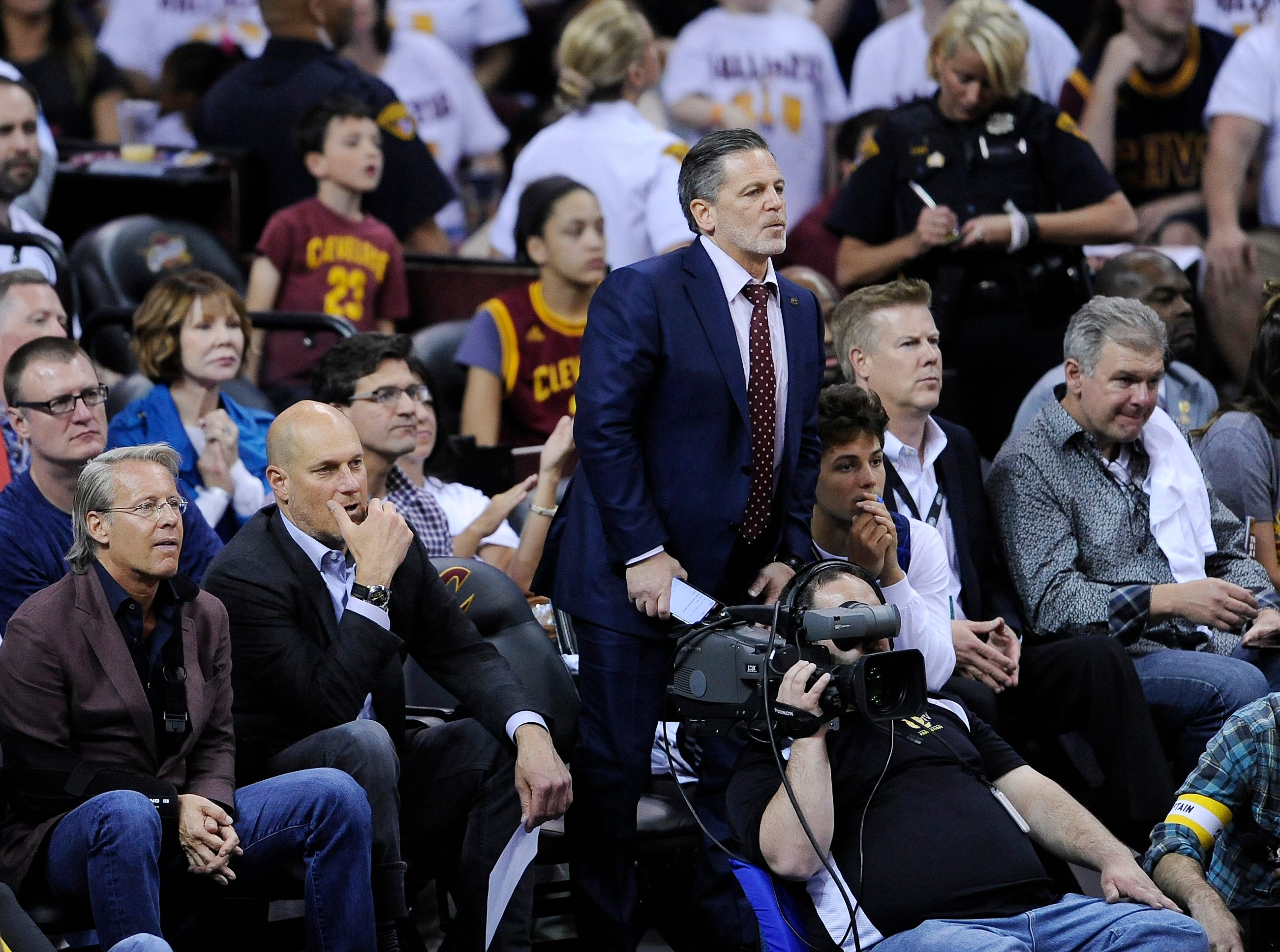 Cleveland Cavaliers owner Dan Gilbert stands to watch his team during a game between the Detroit Pistons and the Cleveland Cavaliers during the first round of the NBA playoffs at Quicken Loan Arena, in Cleveland, Ohio. April,20, 2016.