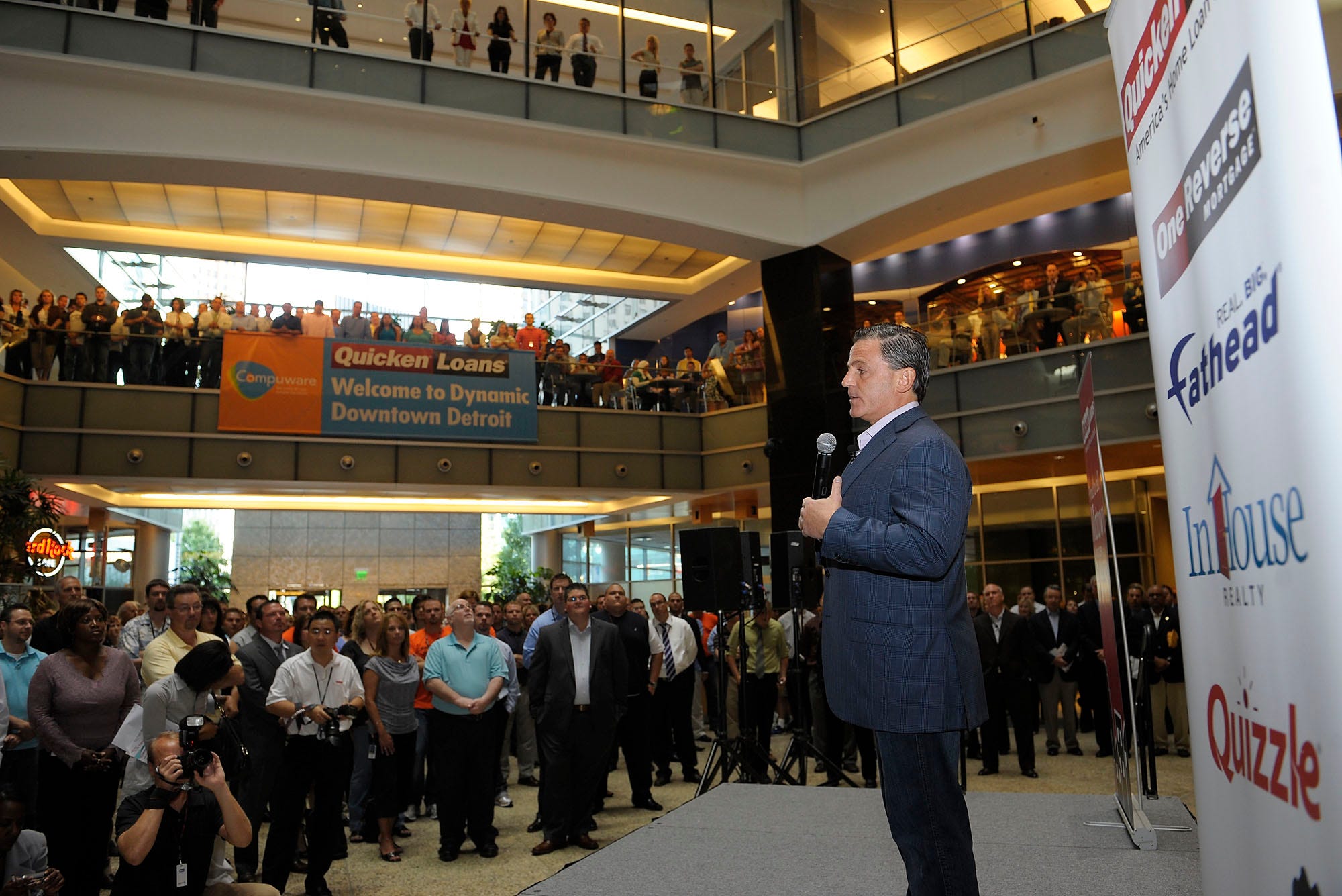 Dan Gilbert, founder and chairman of Quicken Loans, addresses his employees during a press conference at the Compuware building, August 16, 2010.