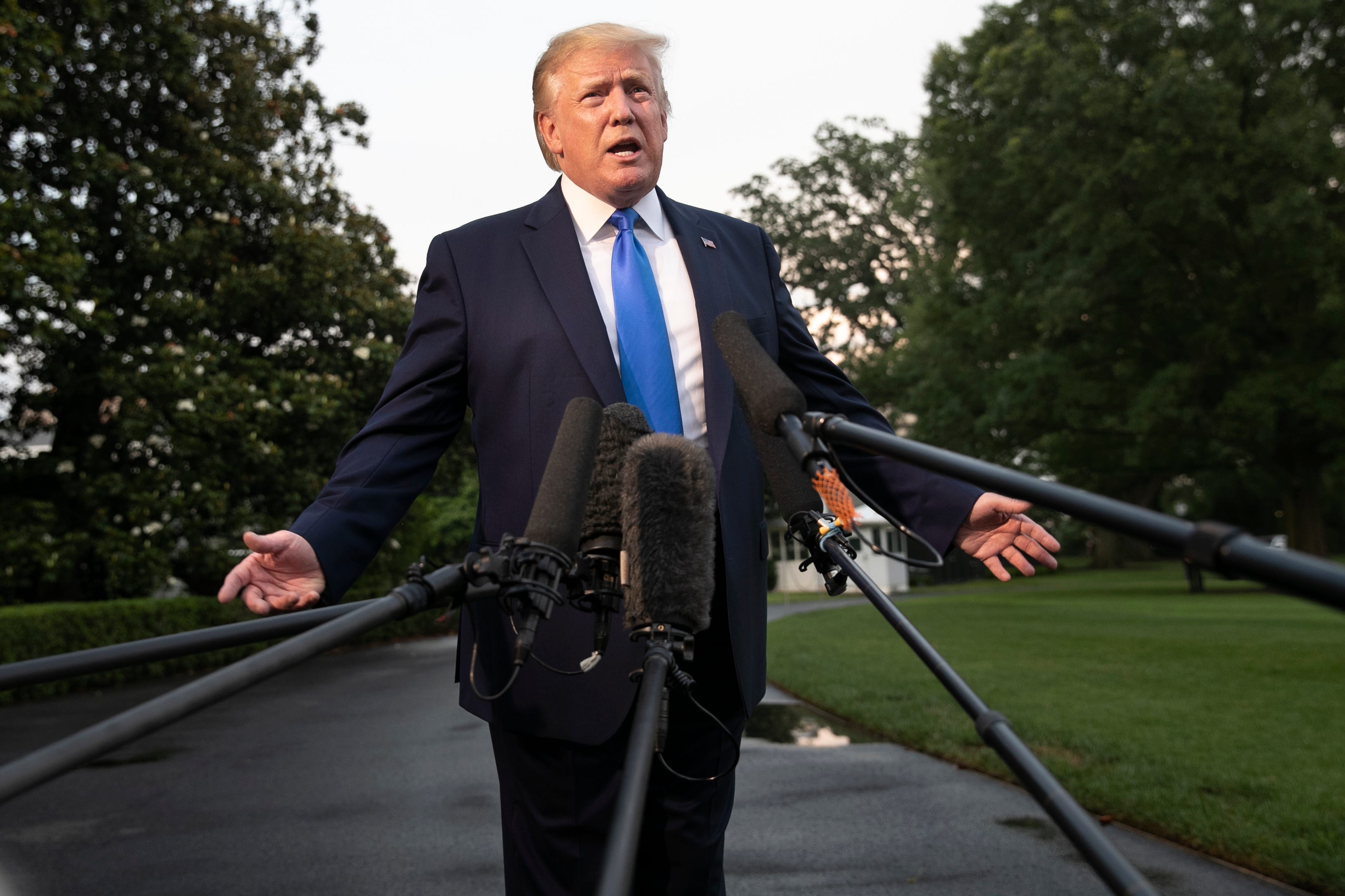 President Donald Trump speaks to the media before departing the White House, Sunday June 2, 2019, en route to London.