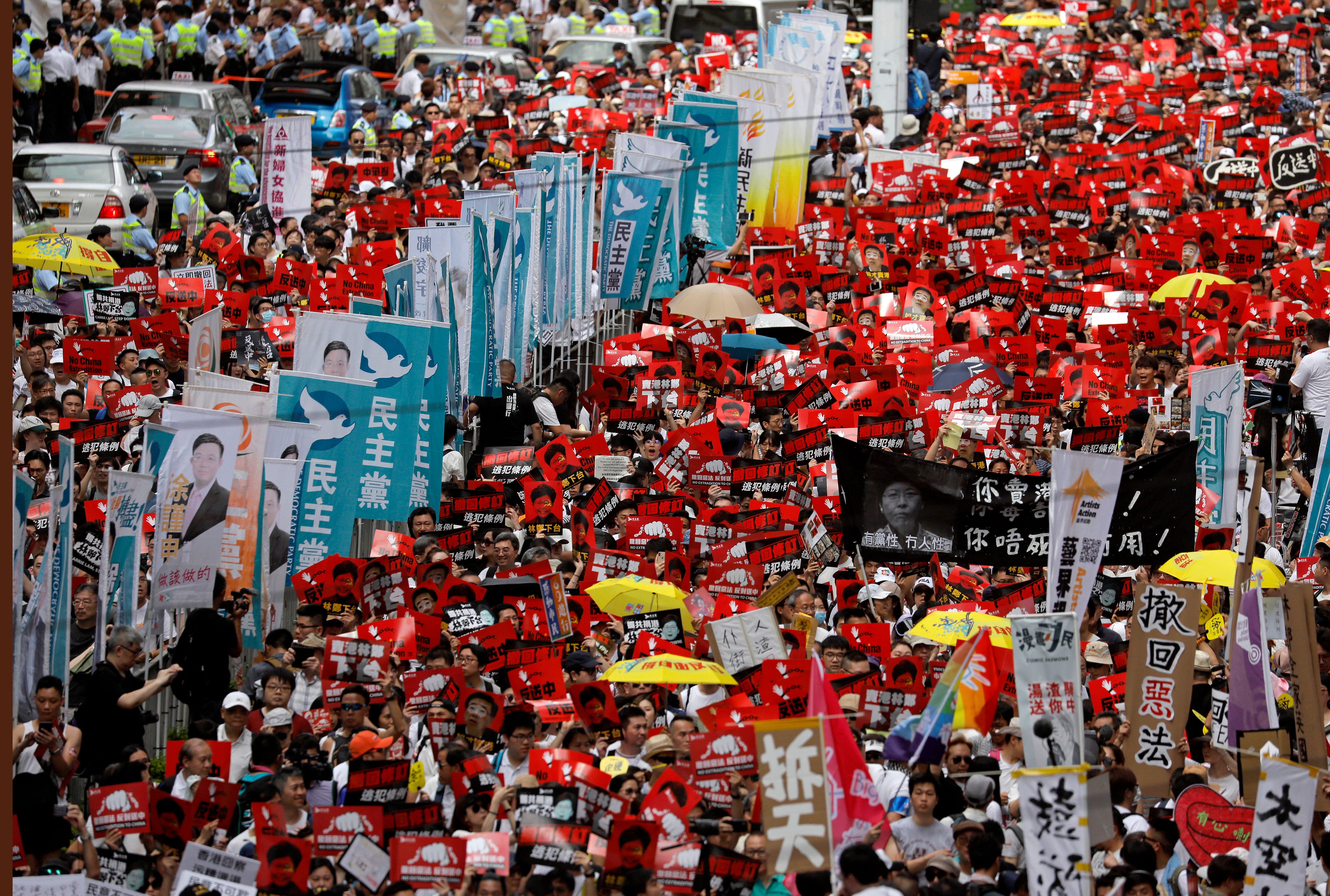 A sea of protesters is marching through central Hong Kong in a major demonstration against government-sponsored legislation that would allow people to be extradited to mainland China to face charges.