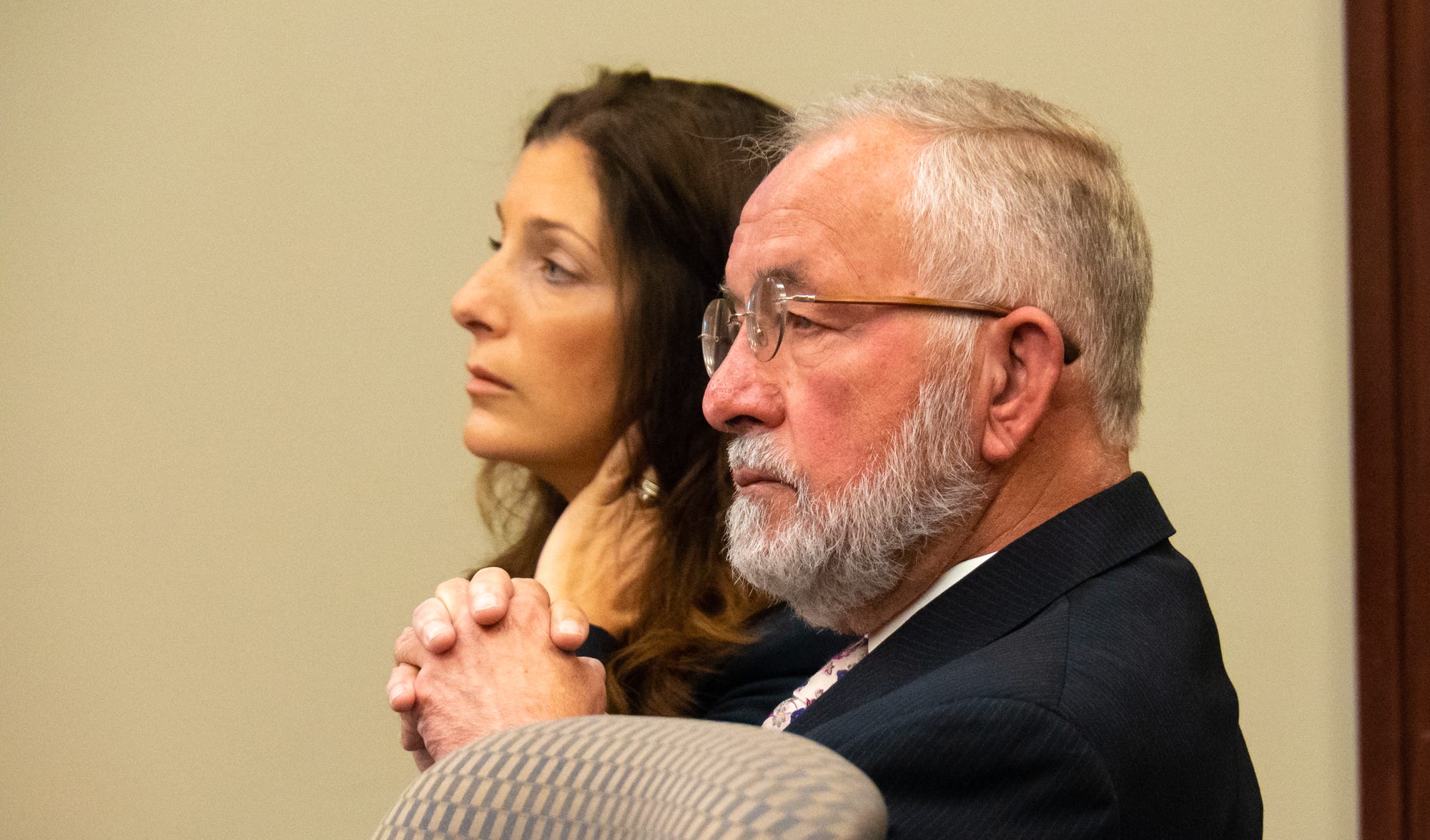 William Strampel, the former dean of Michigan State University's College of Osteopathic Medicine, sits at the defense table during closing arguments in his trial on misconduct and sexual assault charges on Tuesday, June 11, 2019, in Ingham County Court in Lansing.