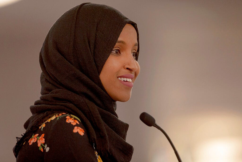 In this May 18, 2019 file photo, Rep. Ilhan Omar, D-Minn., speaks during the fourth annual Citywide Iftar Dinner in Austin, Texas. A campaign finance investigation found that Omar filed joint tax returns with her husband before they were legally married. The Minnesota Campaign Finance and Public Disclosure Board says Omar and her husband filed joint tax returns for 2014 and 2015. They weren't married until 2018. Omar's campaign says all of her filings are fully complaint with applicable tax law.