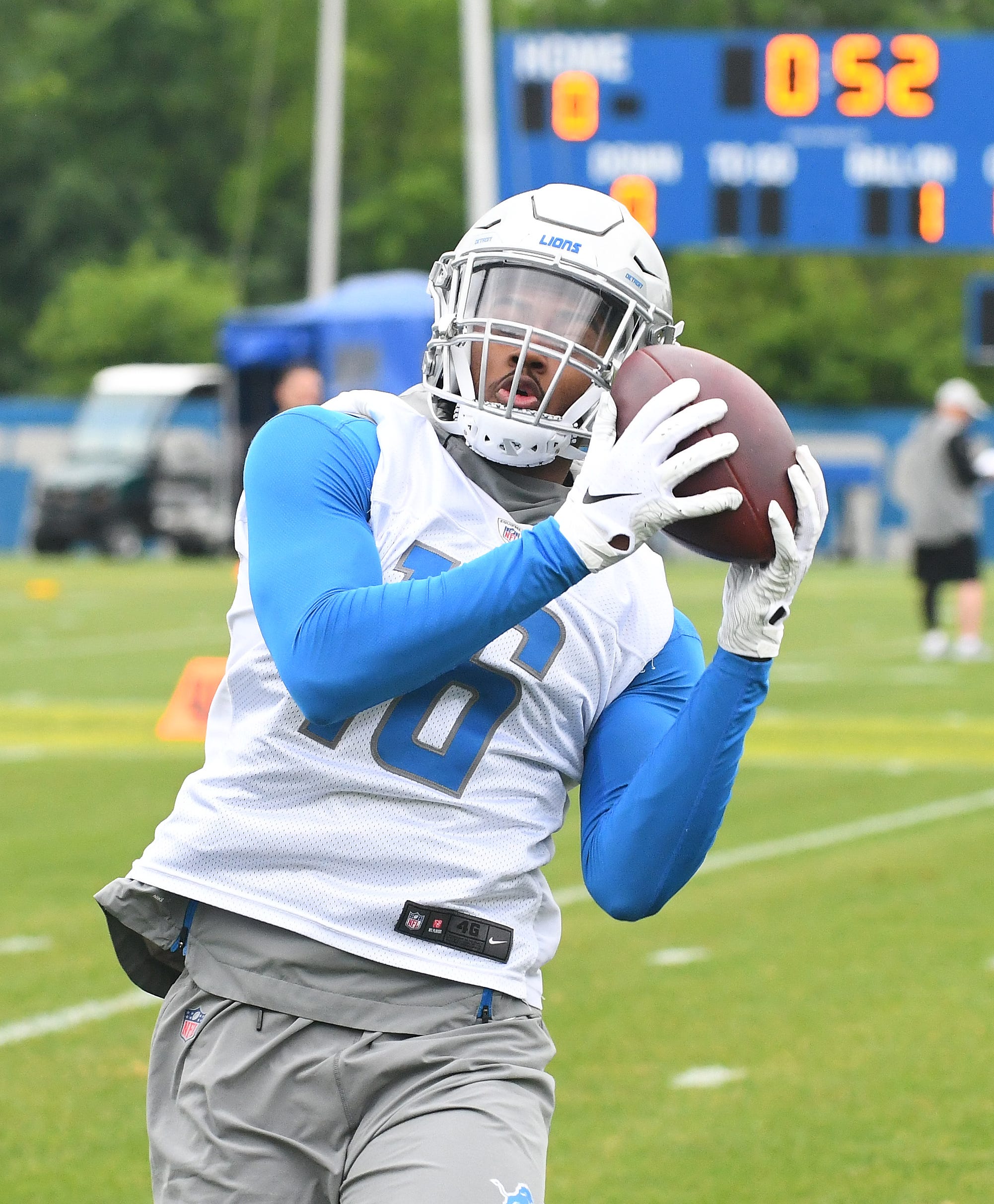 Lions wide receiver Deontez Alexander holds onto a reception during drills.