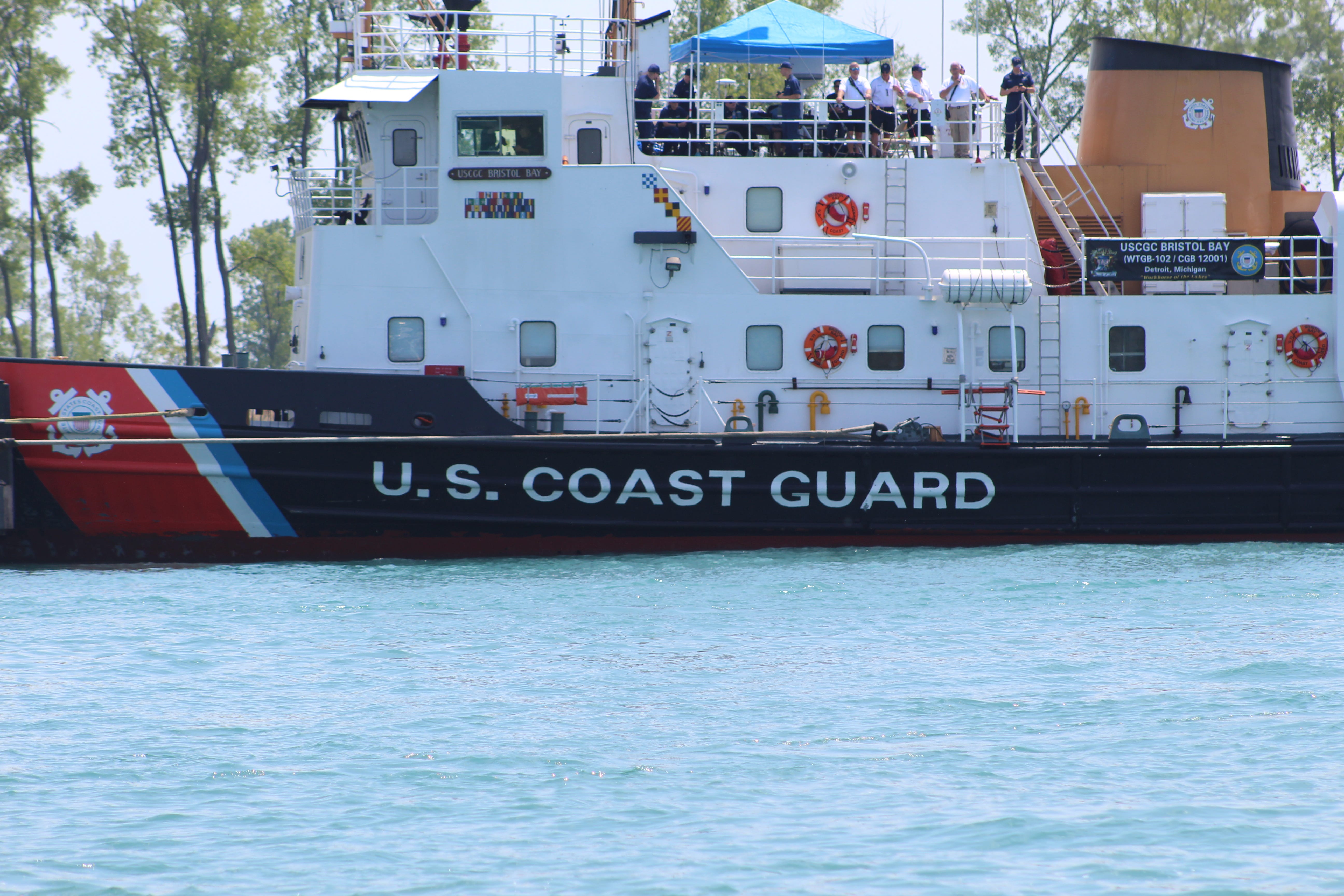 Officers aboard a U.S. Coast Guard vessel keep an eye on revelers at Jobbie Nooner.