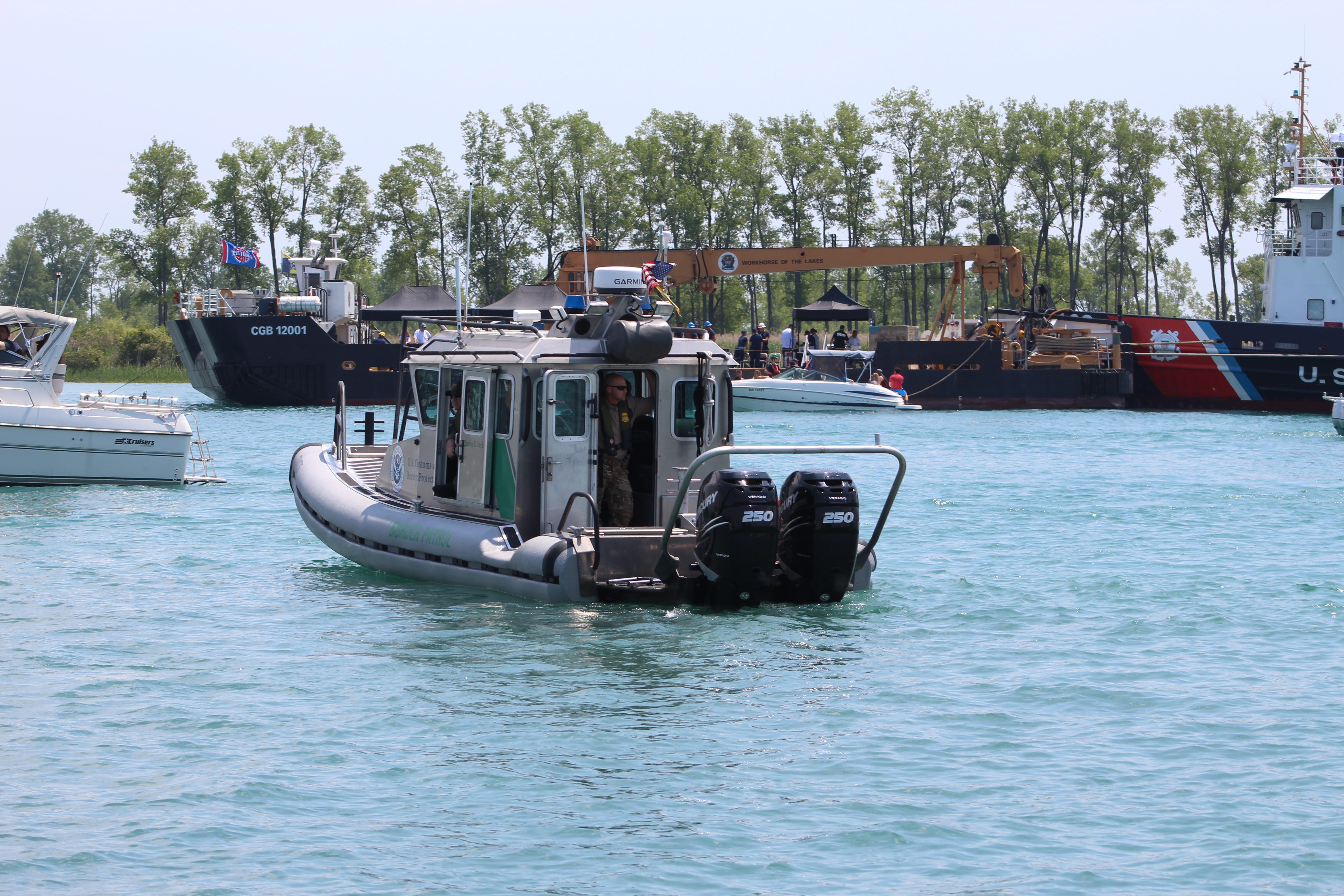 A U.S. Customs and Border Patrol boat patrols the waters around Gull Island during Jobbie Nooner on Lake St. Clair, Friday, June 28, 2019.