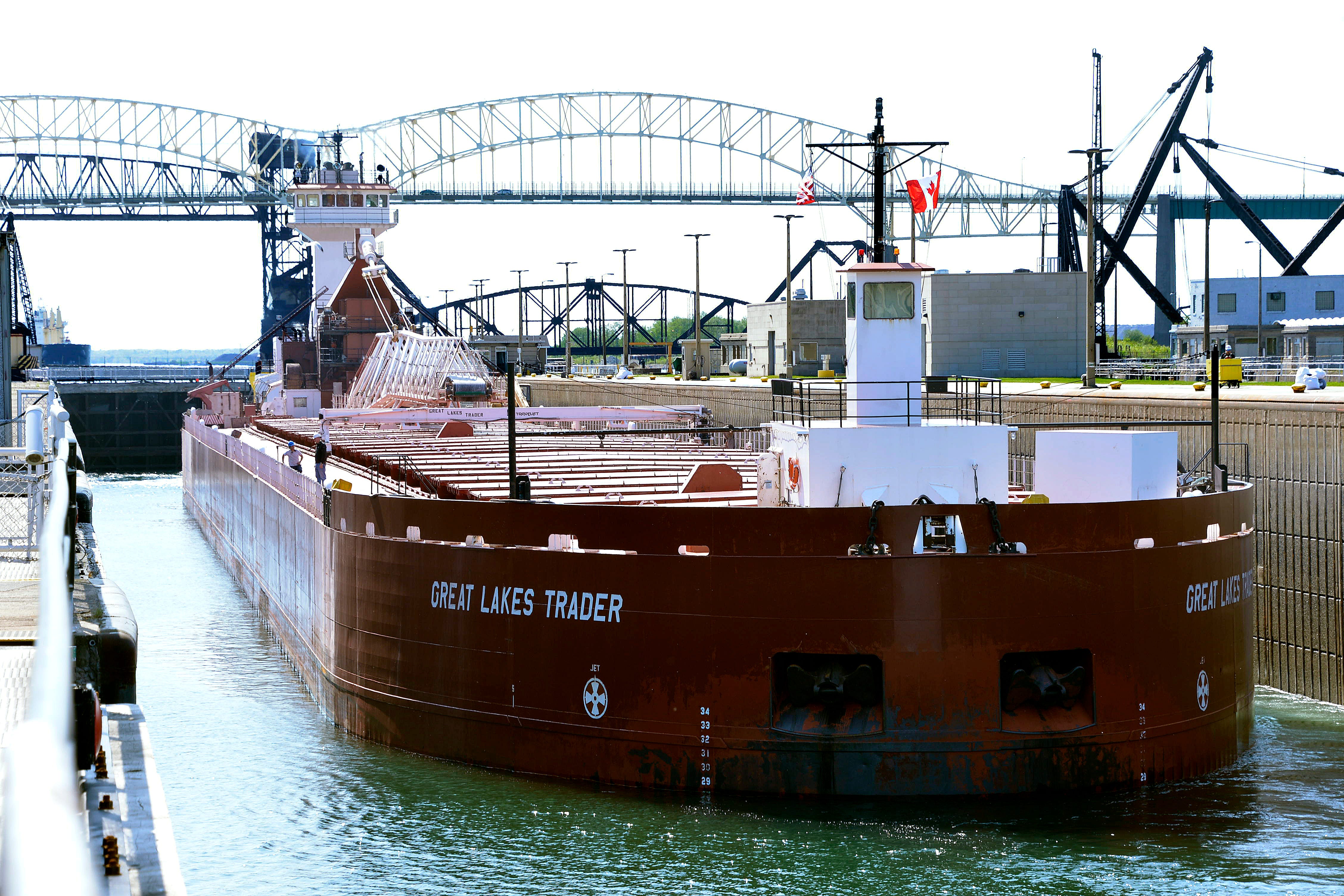 The Great Lakes Trader passes downstream through the Poe Lock in Sault Ste. Marie.