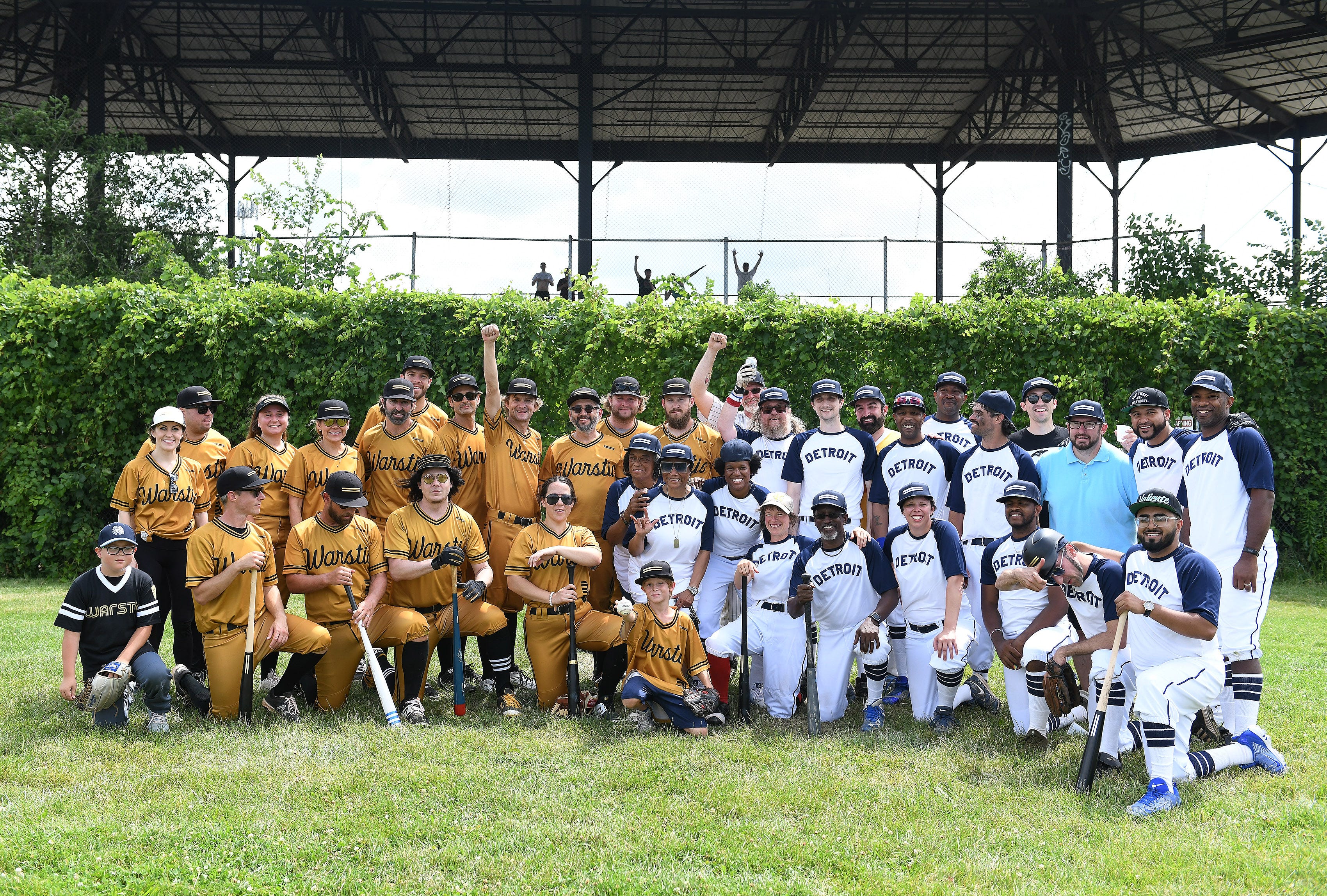 The team photo after the sandlot style baseball game between the Warstic Woodmen and the Detroit Stars at Hamtramck Stadium in Hamtramck, Mich. on July 11, 2019. Jack White has donated $10,000 towards the renovation and restoration of the stadium, once home to the Detroit Stars Negro League team.