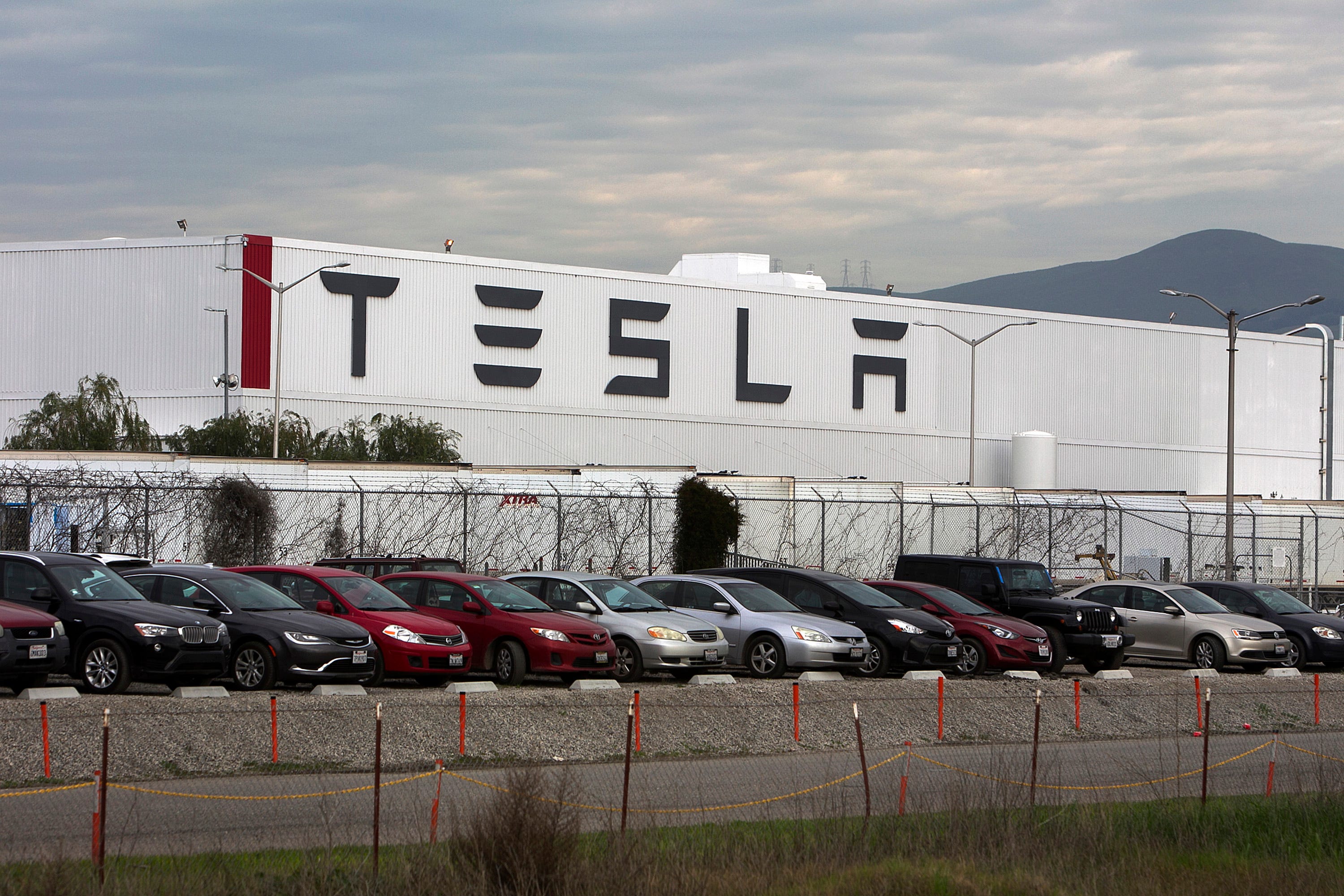 Tesla says Randeep Hothi, who lives near the company’s Fremont, Calif., assembly plant, struck a security employee with his car and later endangered workers testing a Model 3. Hothi says Tesla is lying.