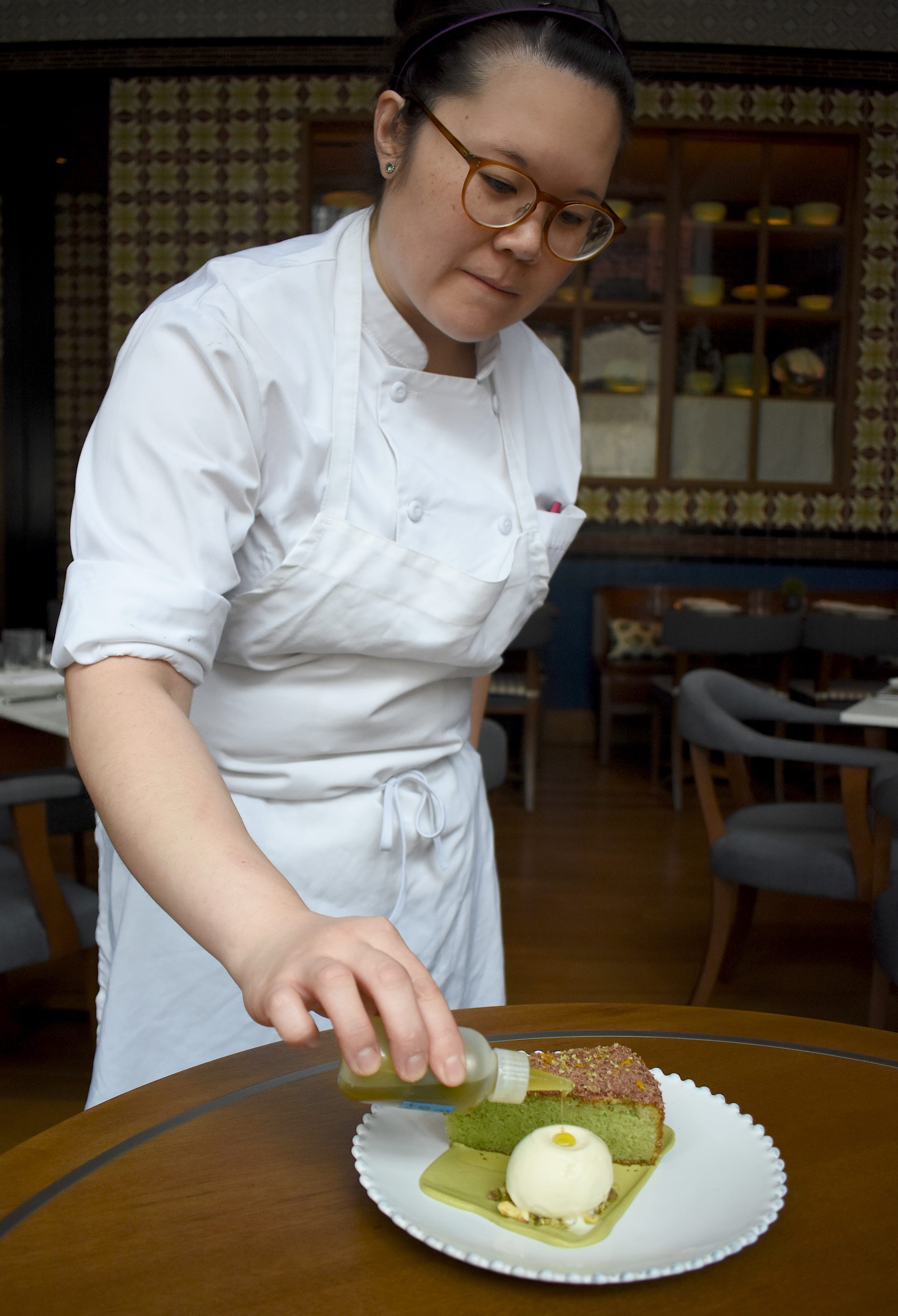 Shinola Hotel pastry chef Jessica Leung tops an olive oil gelato with a few drops of the golden liquid.