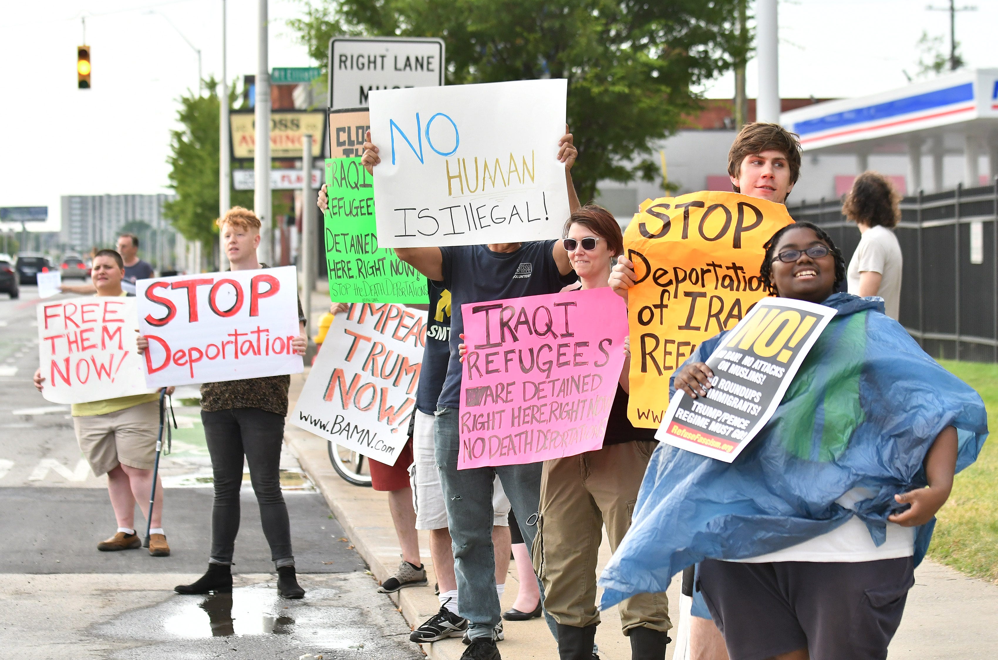 People protest in front of the ICE Detroit Field Office in Detroit Friday evening after  five Iraqis allegedly were detained and held for deportation.