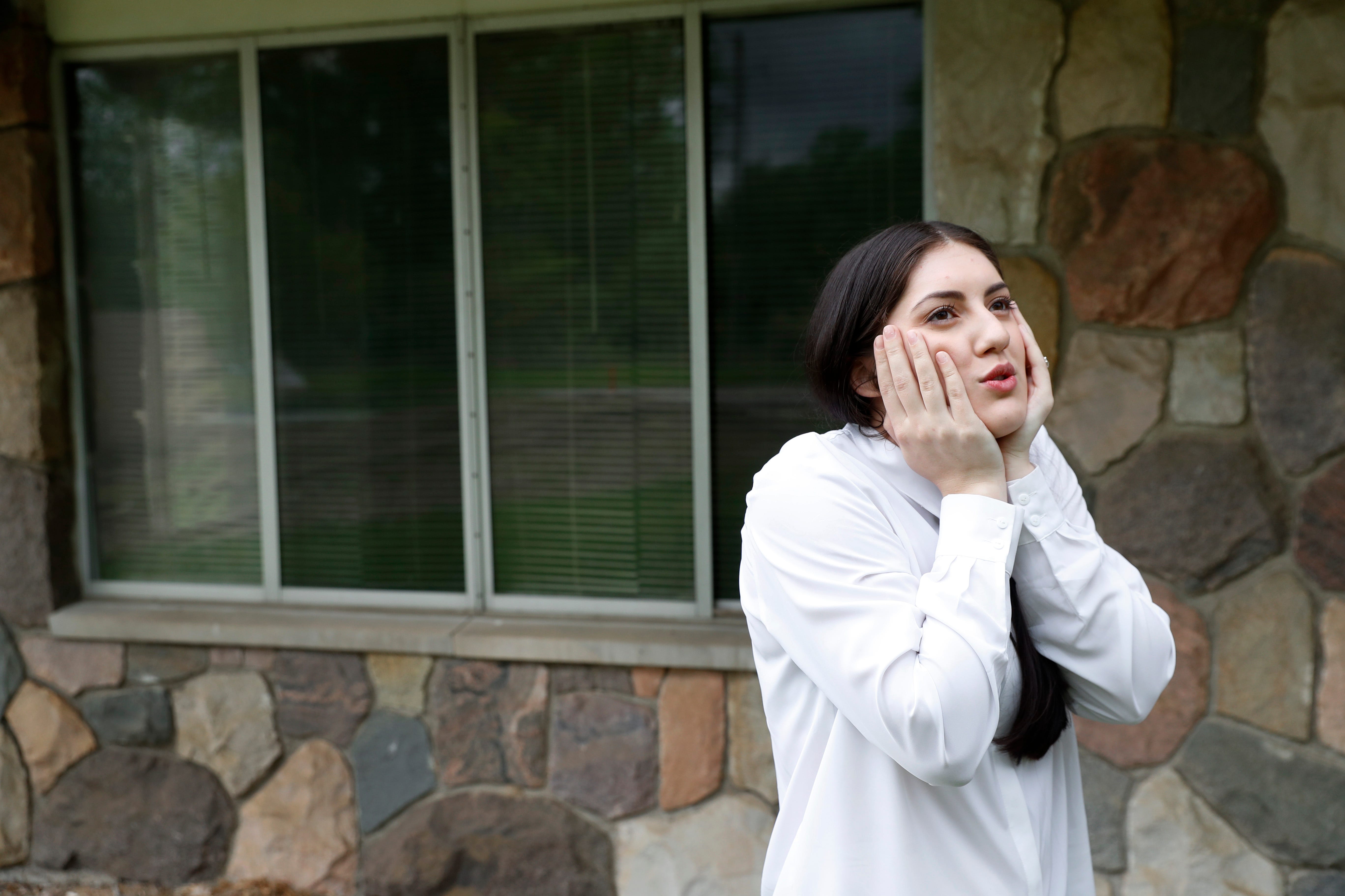 Mary Rose Maher, the daughter of Opus Bono Sacerdotii co-founder Joe Maher, visits a former Opus Bono location in Oxford, Michigan, June 5. In a February 2017 letter to the state attorney general, she wrote, a simple investigation into the Michigan nonprofit charity Opus Bono Sacerdotii would bring to light the millions of embezzled dollars, years of mail fraud, and the constant systemic abuse of donations.