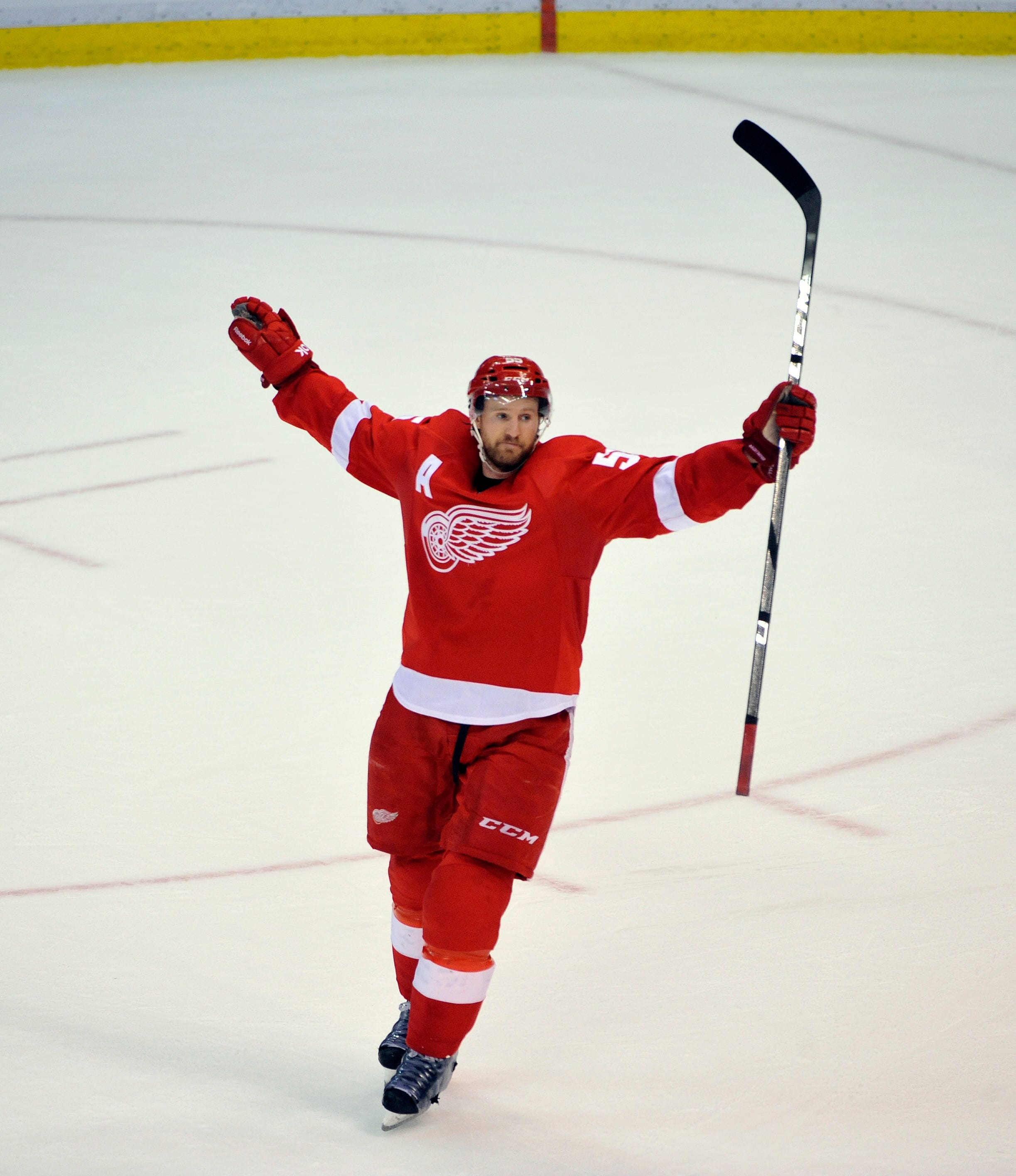 Detroit alternate captain Niklas Kronwall lifts his arms in victory as the final seconds of a 2-0 victory over Chicago tick away. The Wings took a 3-1 series against the Blackhawks at Joe Louis Arena in Detroit on May 23, 2013.