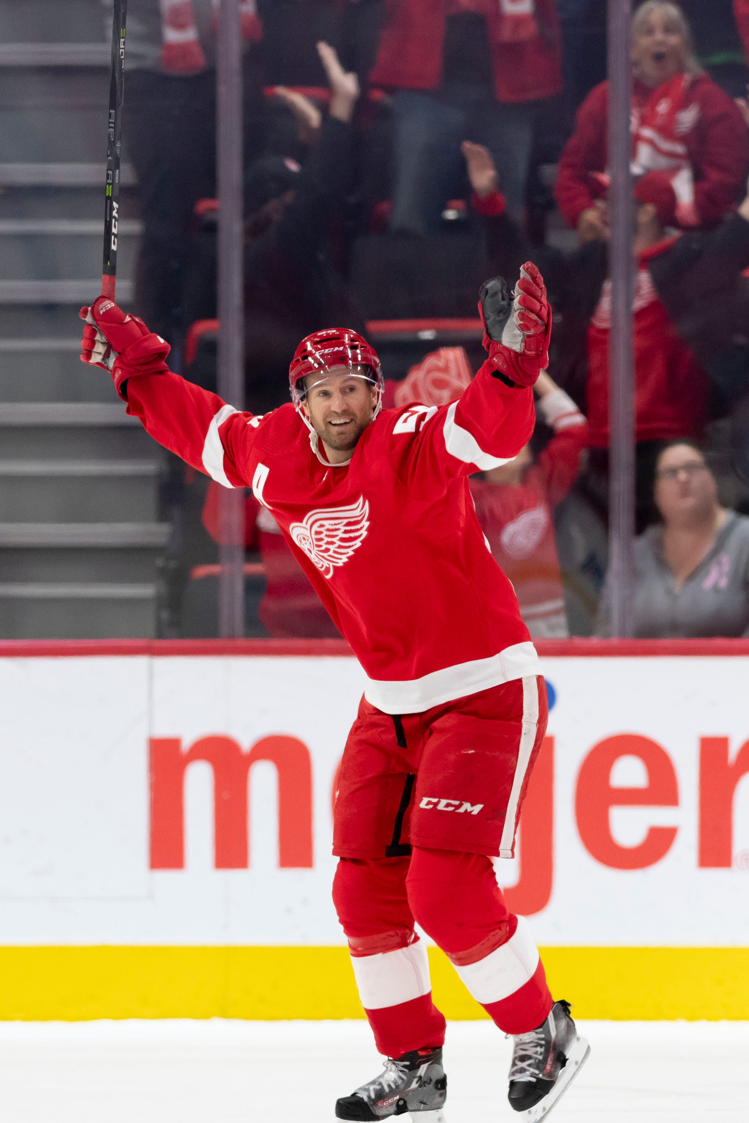Detroit defenseman Niklas Kronwall celebrates an empty-net goal by defenseman Trevor Daley during a victory over the New Jersey Devils at Little Caesars Arena on Nov. 1, 2018.