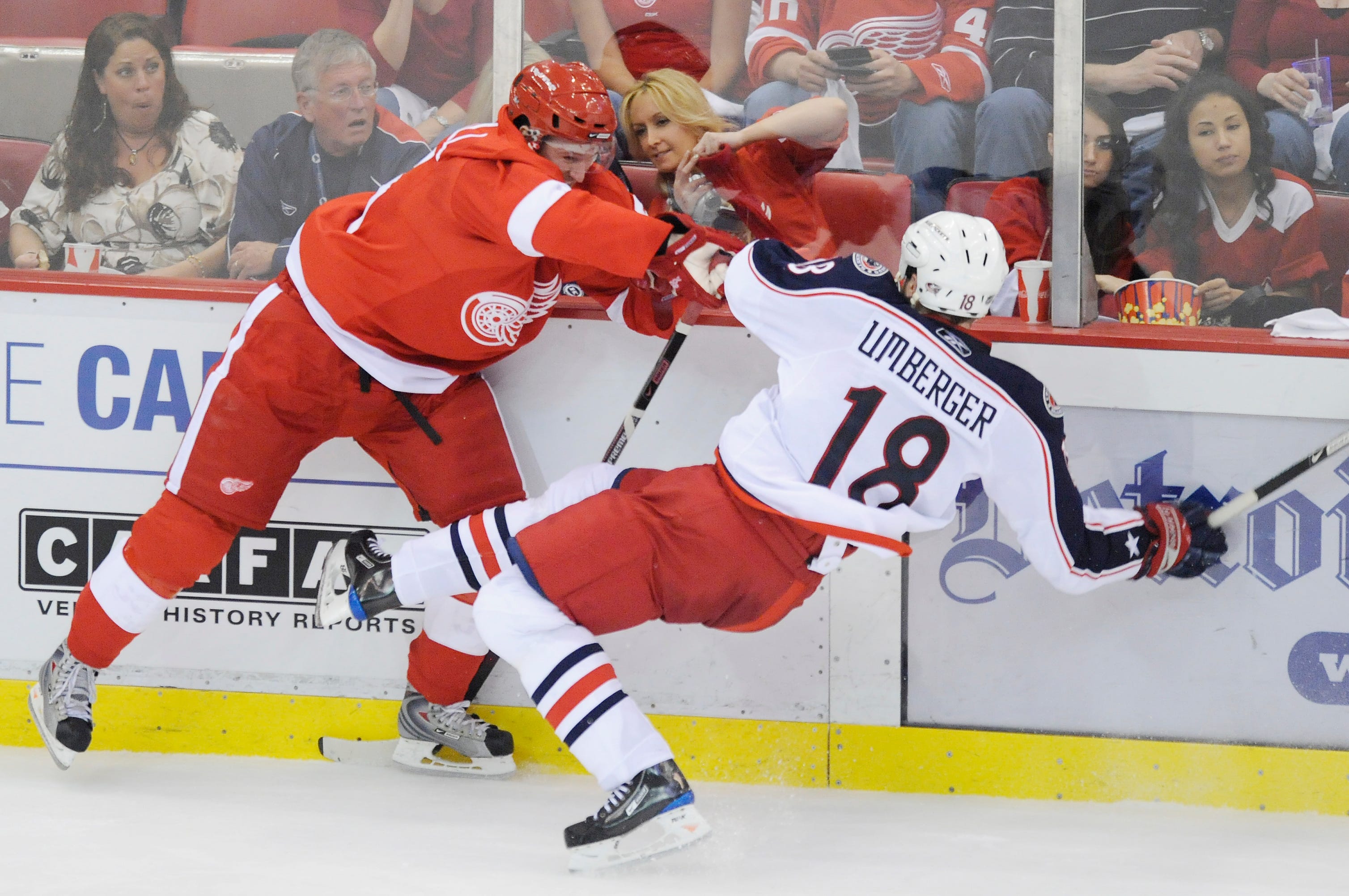 Detroit Red Wings defenseman Niklas Kronwall checks Columbus Blue Jackets center R.J. Umberger, knocking him backward during a 4-0 victory in Game 2 of their Eastern Conference playoff series on Saturday, April 18, 2009.