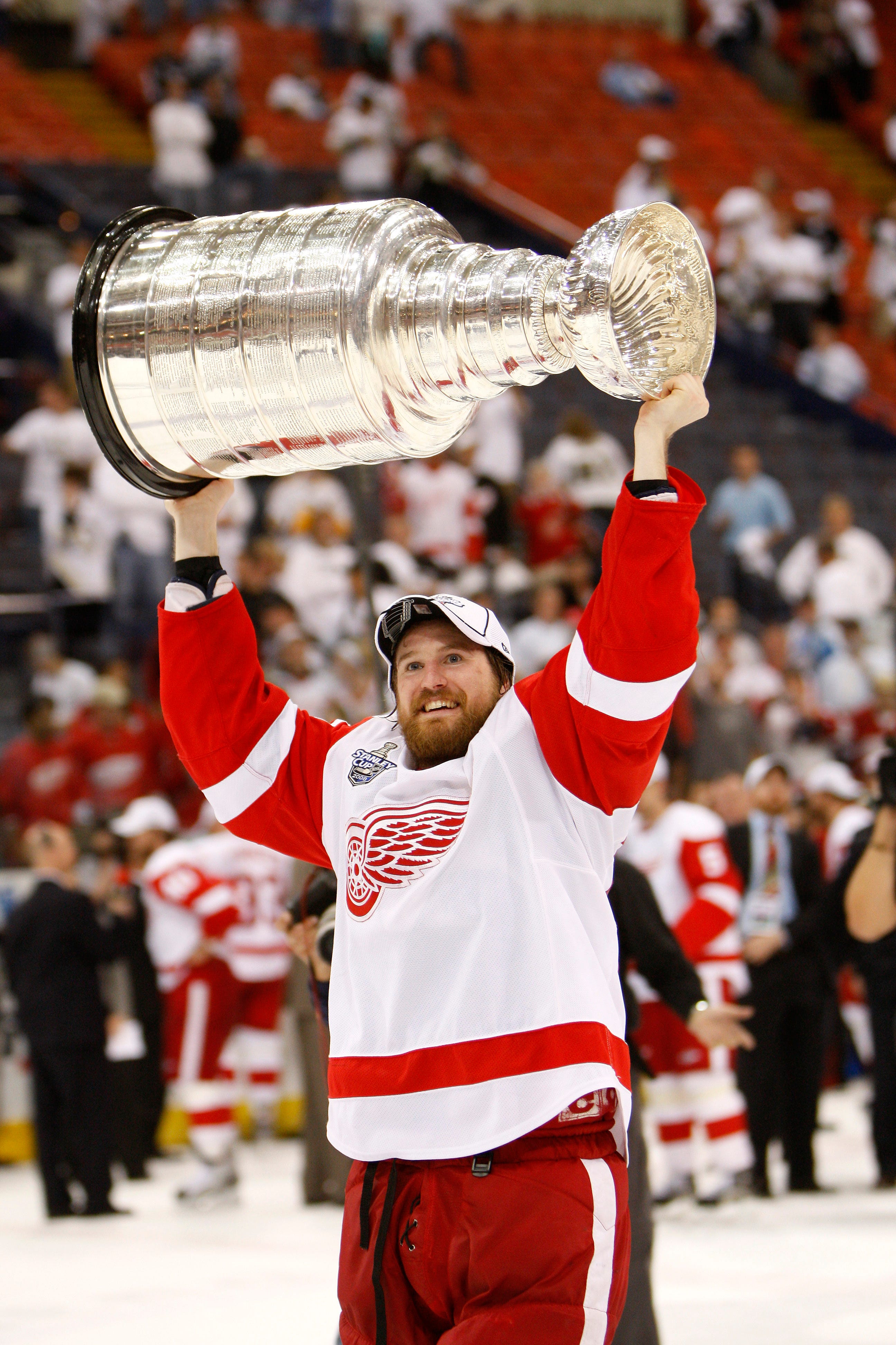 Detroit Red Wings defenseman Niklas Kronwall lifts the cup after the Wings defeated the Penguins in Game 6 of the Stanley Cup Finals at Mellon Arena in Pittsburgh on June 4, 2008.