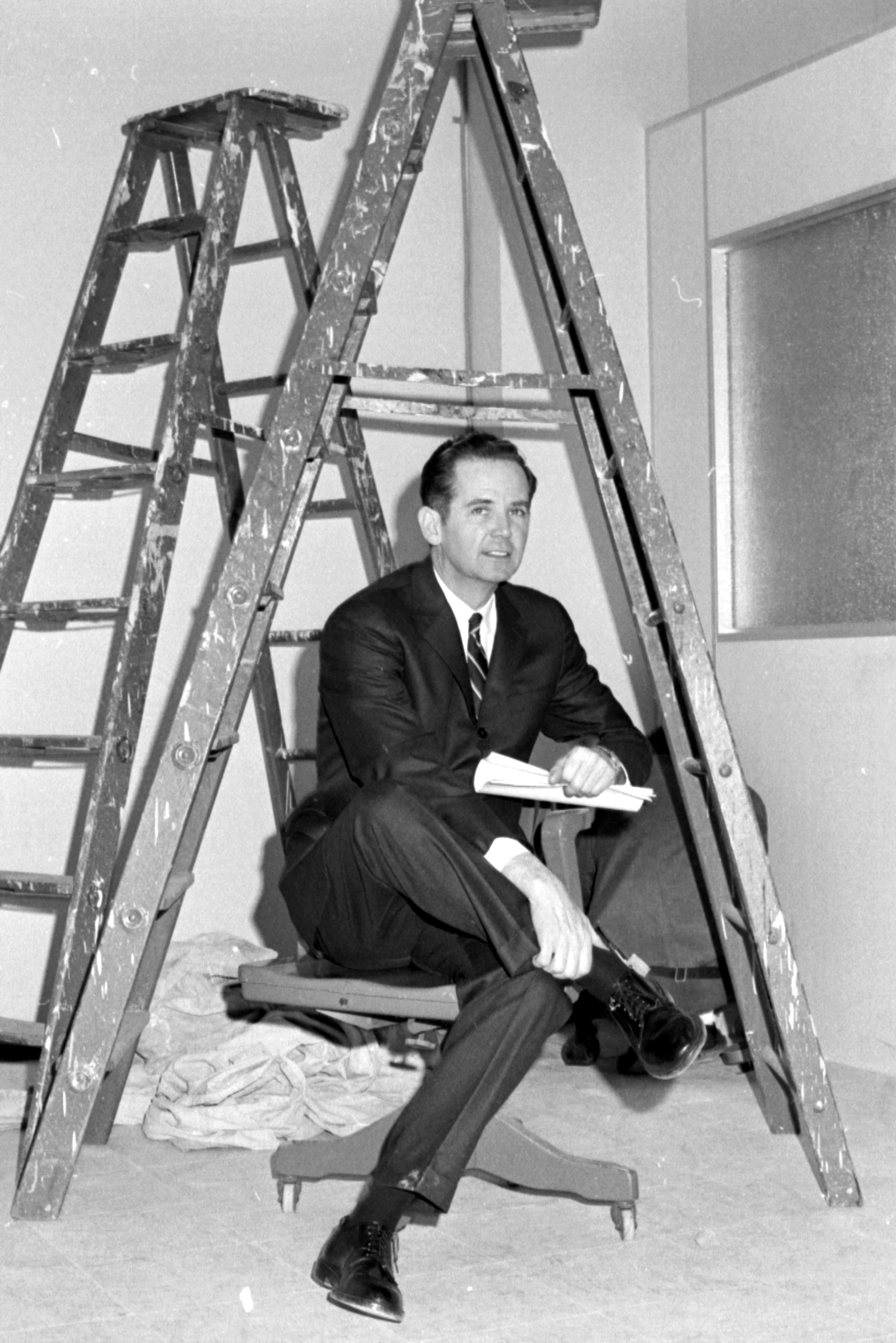 William G. Milliken became Michigan's 44th governor on Jan. 22, 1969. Above, he poses under a ladder at his new Detroit office on Feb. 18.