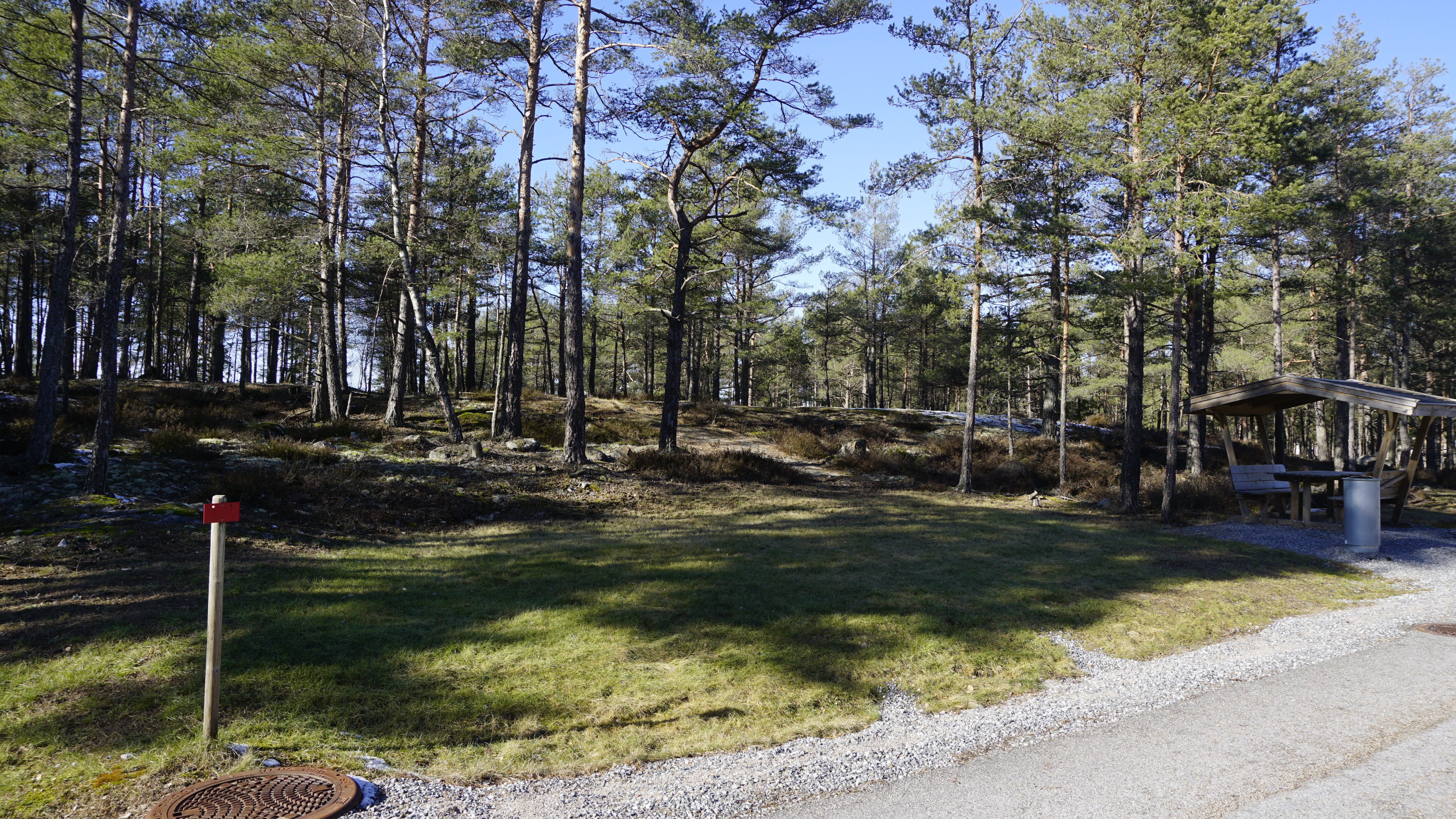 Daily life at Norway's Halden Prison includes frequent walks between housing units, classroom buildings and other areas along tree-lined paths such as this.