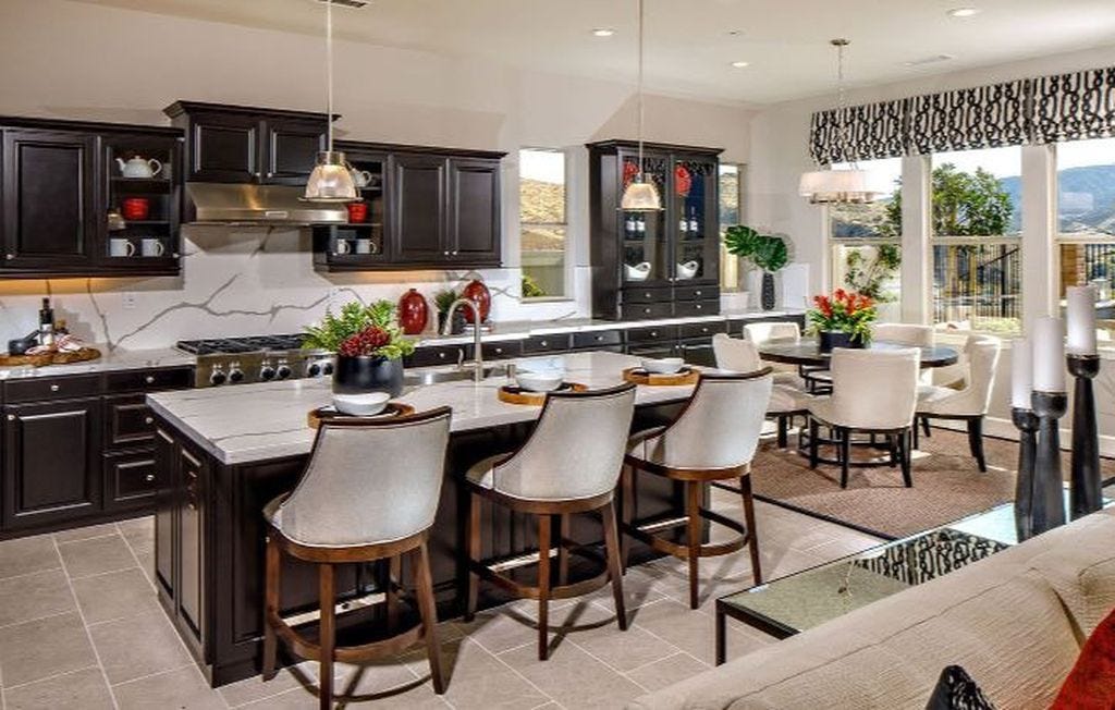 The new home in Corona, California, has a modern kitchen that "is a cook’s dream featuring an oversized island, walk-in pantry, stainless steel appliances and beautiful cabinetry," according to the real estate listing.