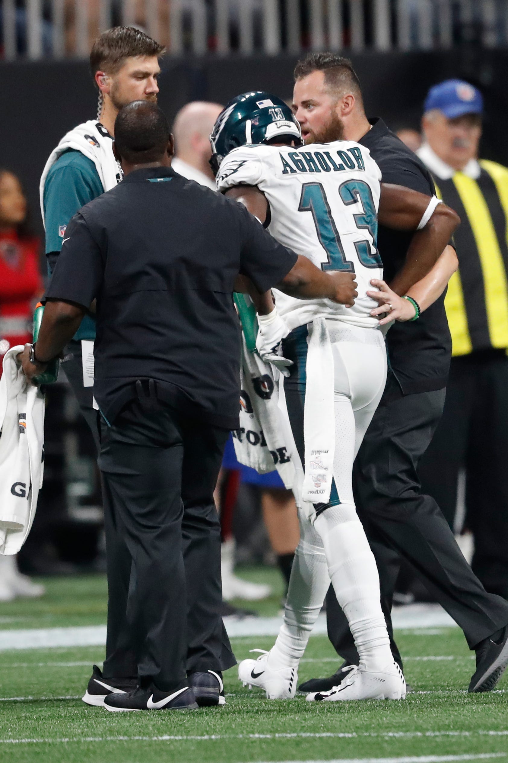 Eagles wide receiver Nelson Agholor (13) walks off the field after an injury Sunday night against the Atlanta Falcons.