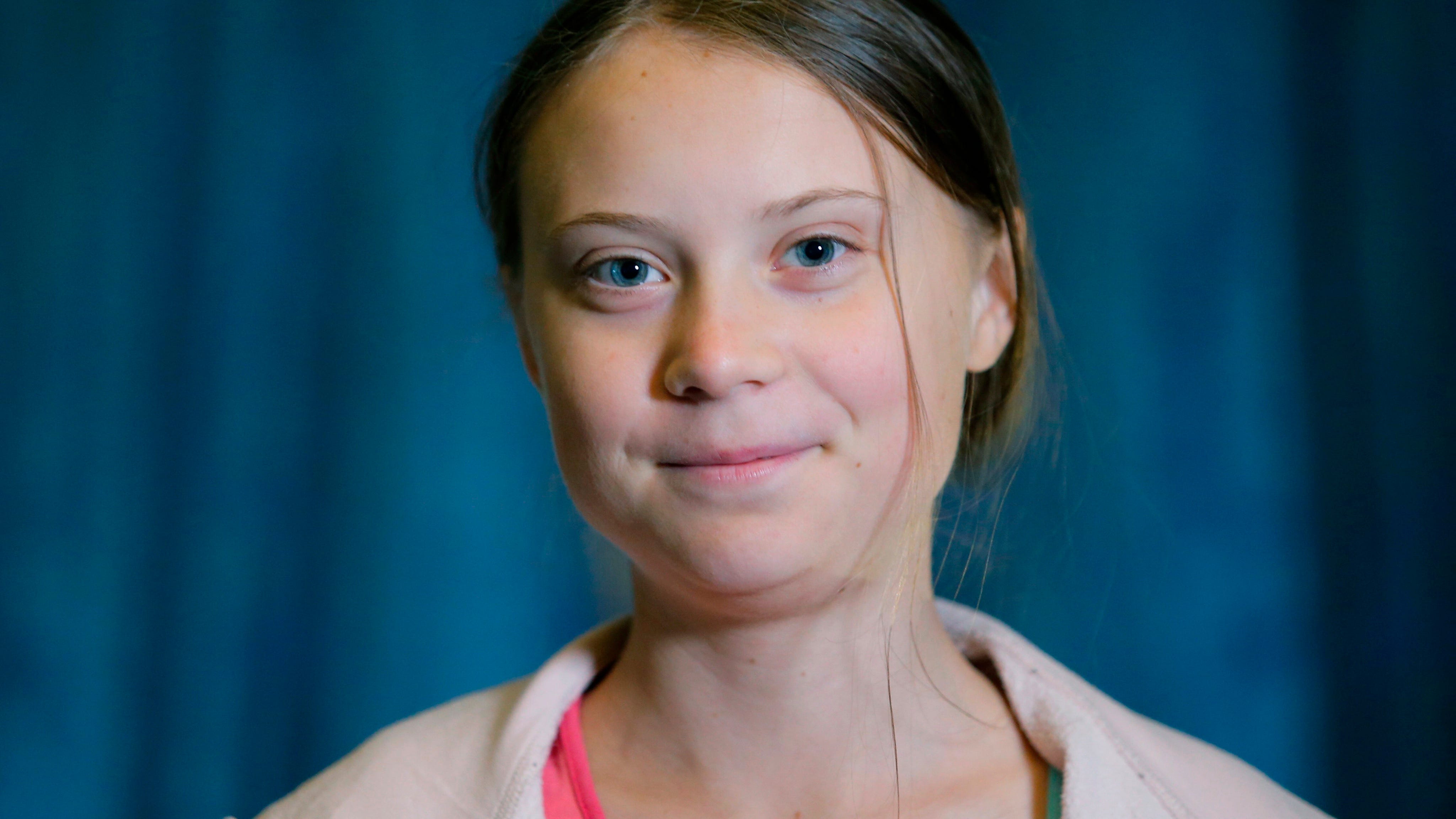 Swedish environmental activist Greta Thunberg poses during an interview with The Associated Press before participating in the "Global Climate Strike," at City Hall, Friday, Sept. 20, 2019, in New York.